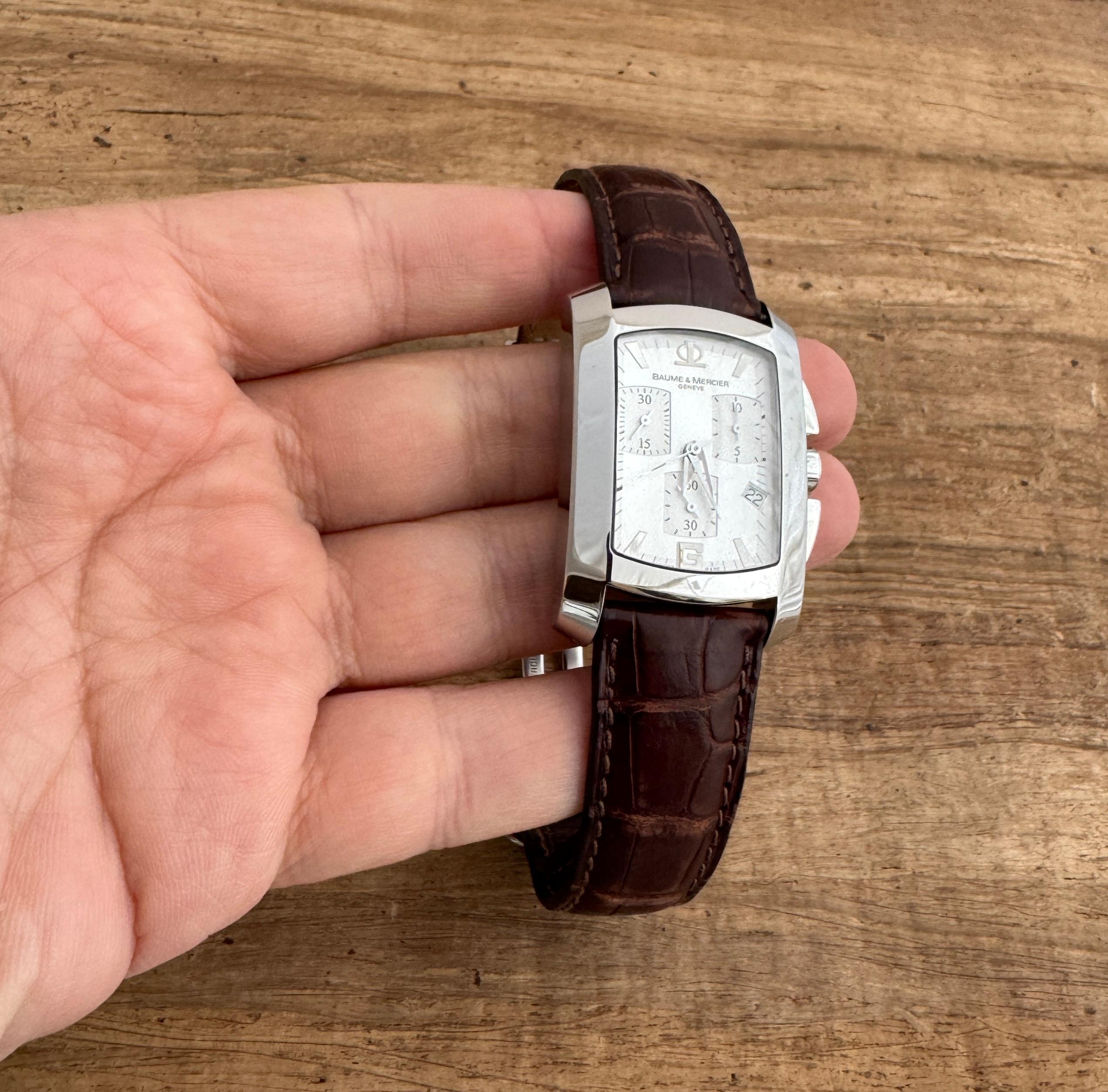 Brand : Baume & Mercier

Model: Hampton

Reference Number: 65448

Country Of Manufacture: Switzerland

Movement: Quartz

Case Material: Stainless Steel

Measurements :30mm diameter (excluding crown )x 45mm

Band Type : Original Baume & Mercier