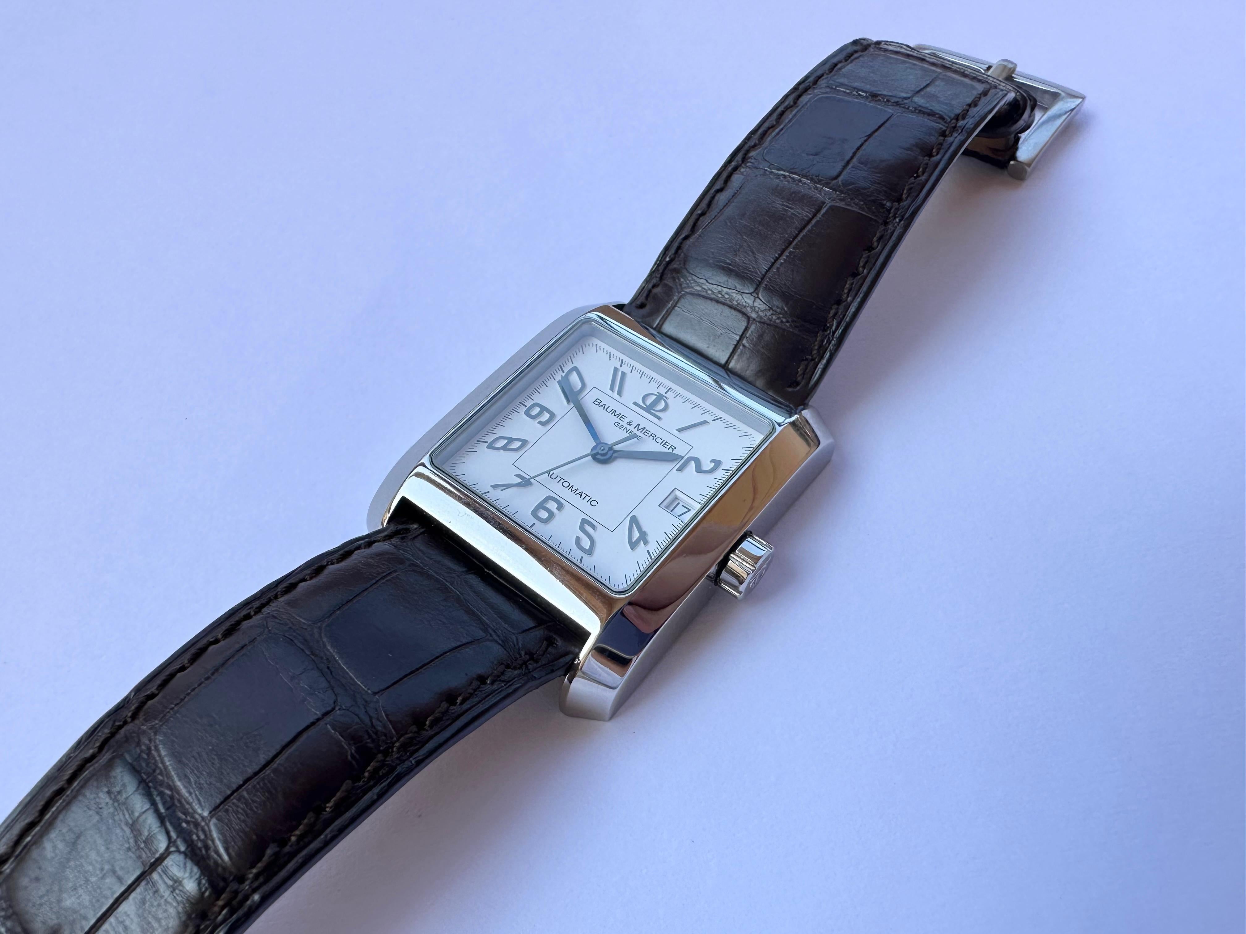 Marke: Baume & Mercier

Modell: Hampton

Referenznummer: 65532

Land der Herstellung: Schweiz

Uhrwerk: Automatik

MATERIAL des Gehäuses: Rostfreier Stahl

Abmessungen: Gehäusebreite: 34 mm (ohne Krone) x45mm mit Bandanstößen

Band Typ : Baume &