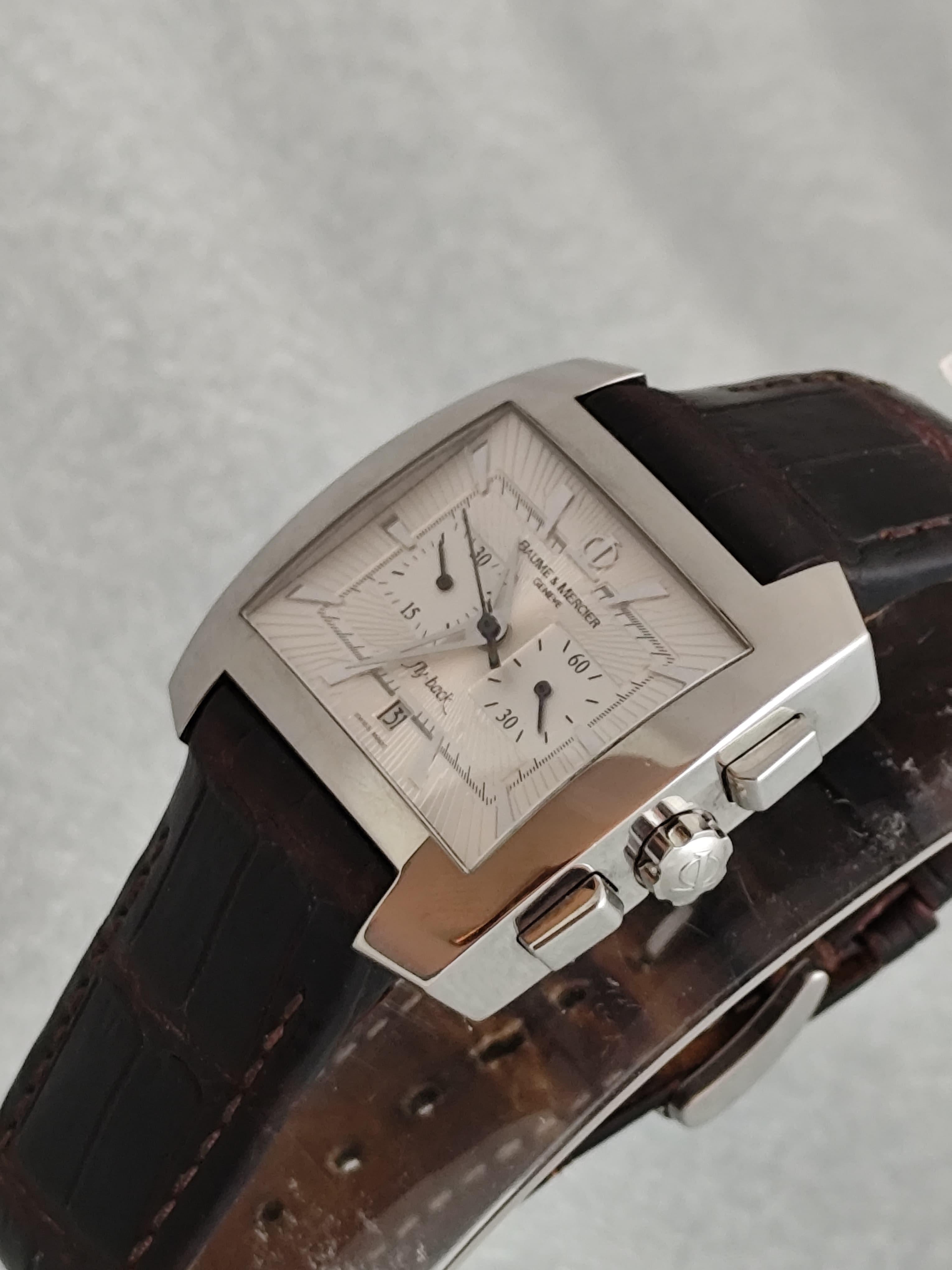 Brand: Baume & Mercier

Model: Hampton Spirit Flyback

Reference Number: 65475

Country Of Manufacture: Switzerland

Movement: Automatic

Case Material: Stainless steel

Measurements : Case width: 42 mm. (without crown)

Band Type :Baume & Mercier