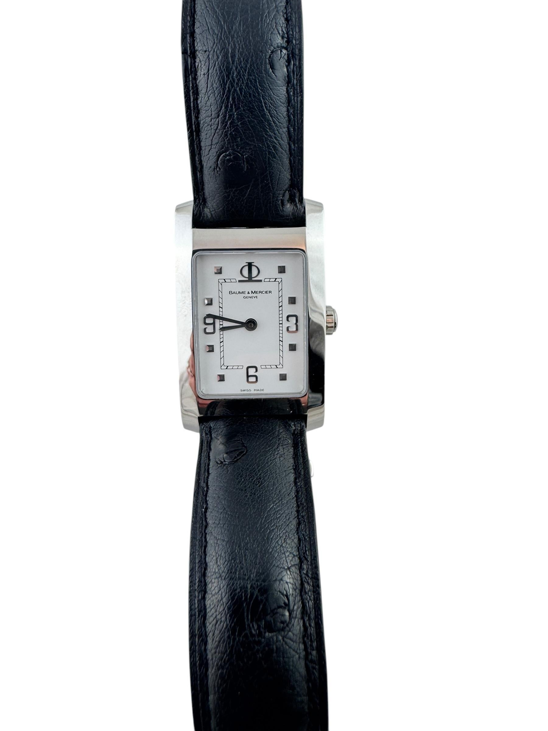 Baume & Mercier Hampton Watch

Model: 65434
Serial: 4409954

This Baume & Mercier Hampton Watch has a stainless steel case 26mm x 40 mm

White dial with silver markers

Baume & Mercier black leather band with deployment clasp

Nestle logo on back of