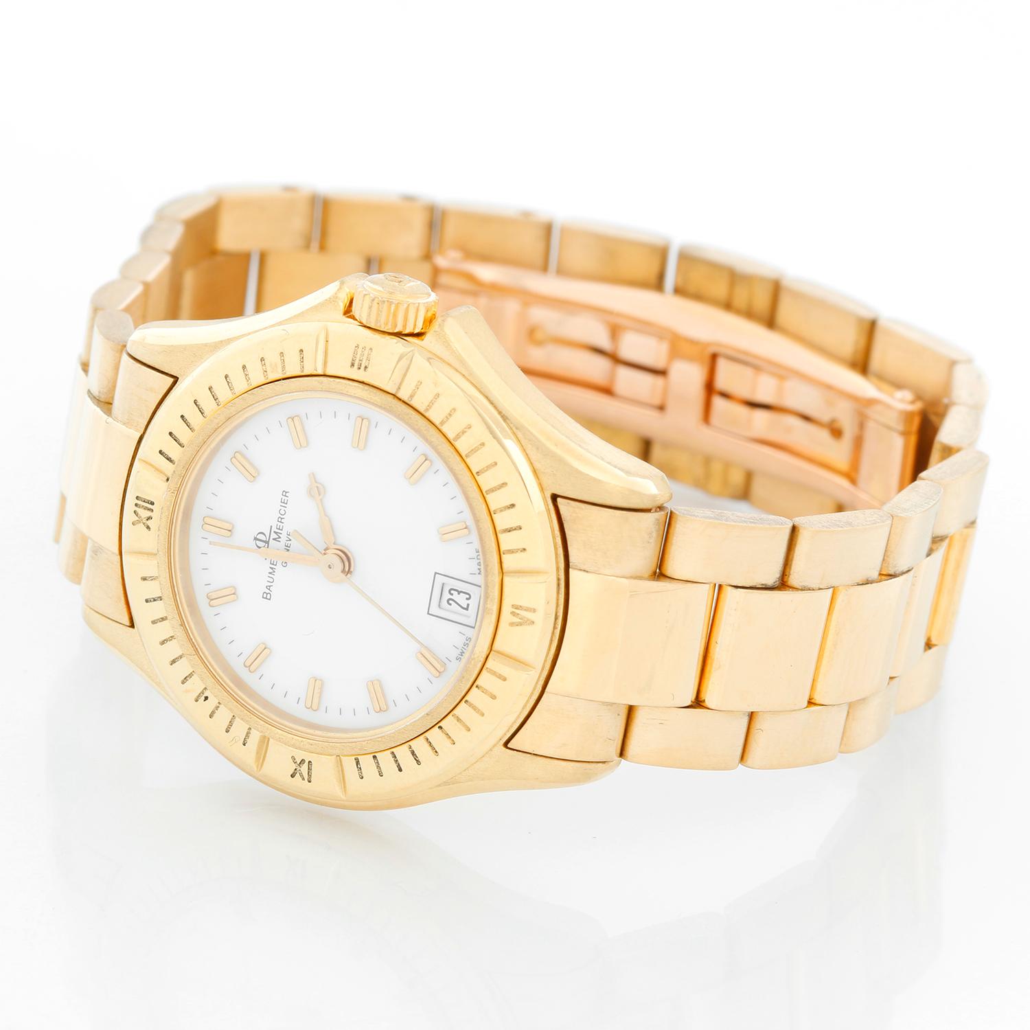 Baume & Mercier Ladies 18K Yellow Gold Riviera Watch MV045109 - Quartz. 18K Yellow gold (28 mm). White dial with stick hour markers; date at 6 o'clock. 18K Yellow gold dial with double deployant clasp; Will git a 6 inch wrist. Pre-owned with custom