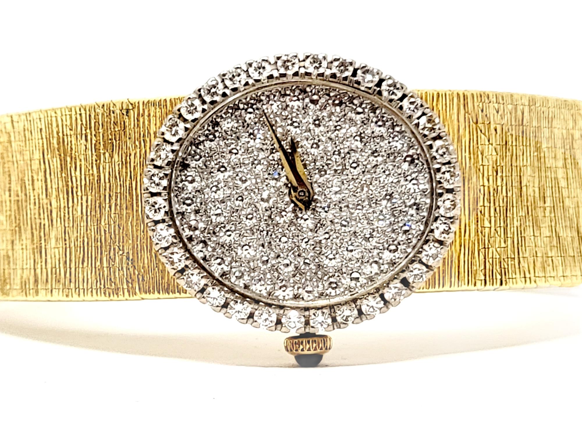 baume and mercier gold watch with diamonds