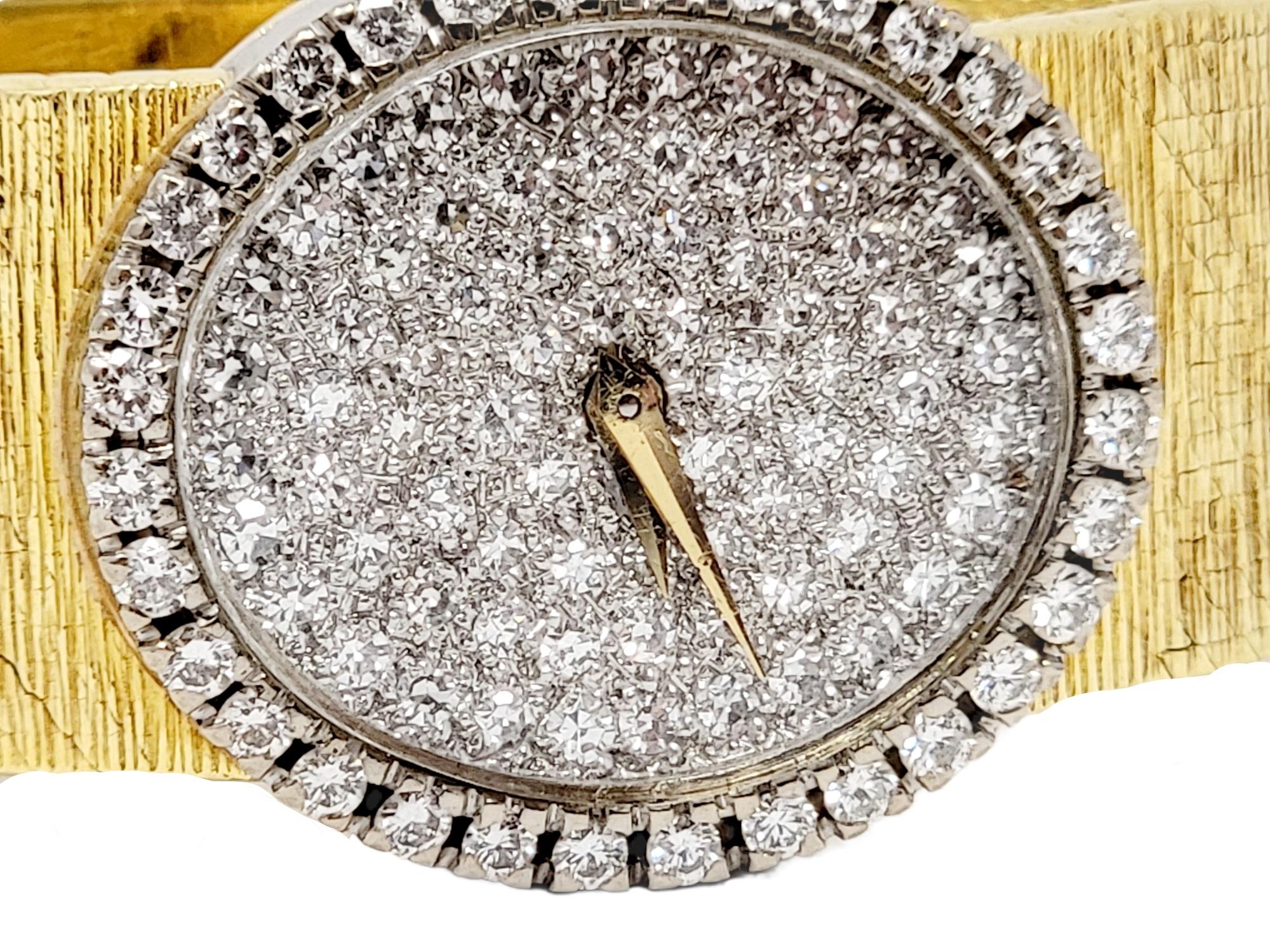 Round Cut Baume & Mercier Ladies Wristwatch with Diamond Dial and Bezel in 18 Karat Gold