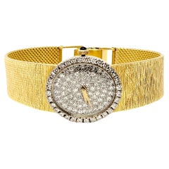 Baume & Mercier Ladies Wristwatch with Diamond Dial and Bezel in 18 Karat Gold