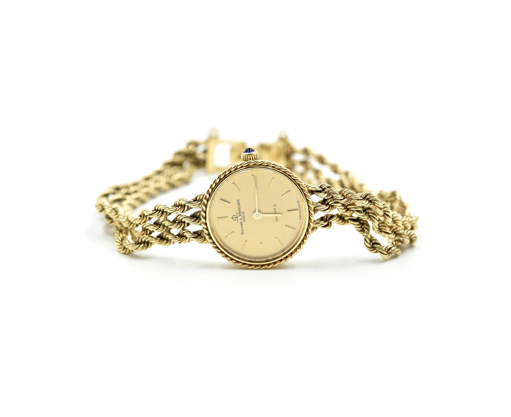 Movement: quartz
Function: hours, minutes
Case: round 18mm 14k yellow gold case with cable bezel, plastic crystal, pull/push crown
Band: 14k yellow gold cable bracelet, fits up to 6 3/4-inch wrist
Dial: champagne dial with yellow gold stick hour