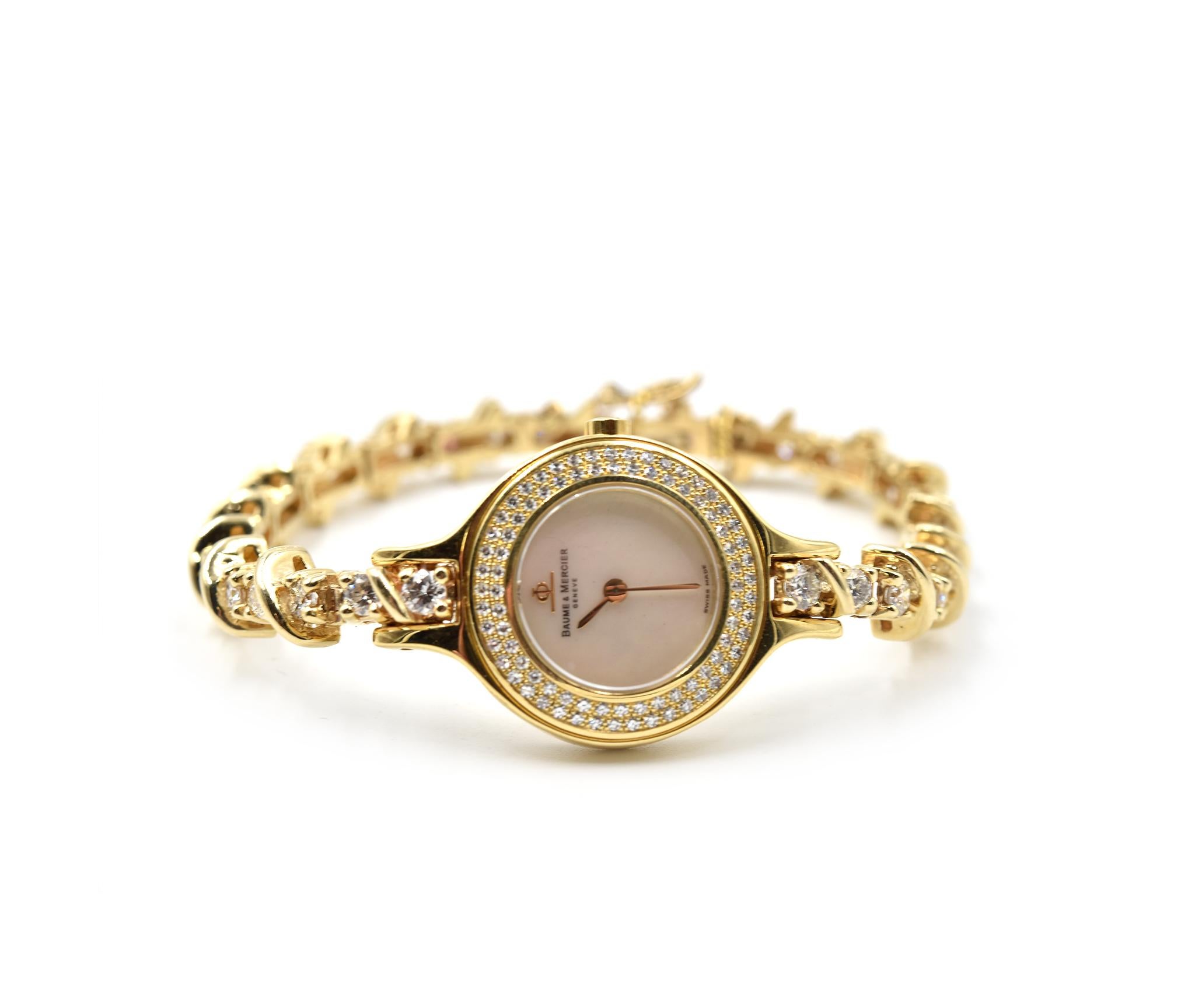 Movement: quartz
Function: hours, minutes
Case: round 21mm 18k yellow gold case with diamond bezel, crystal, pull/push gold crown, solid case back
Band: custom 18k yellow gold diamond bracelet with jewelry clasp
Dial: mother of pearl dial with gold