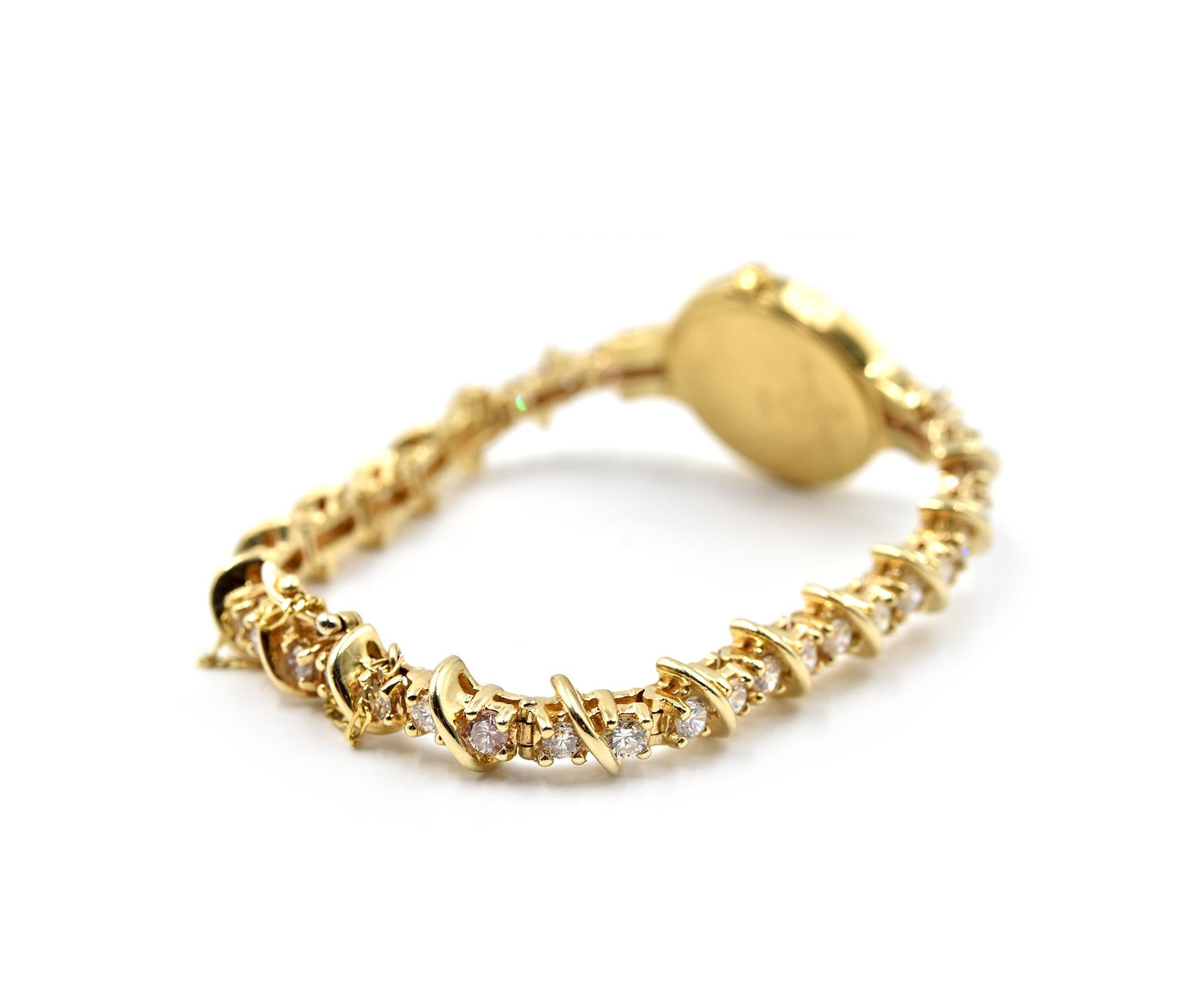 Baume & Mercier Ladies Yellow Gold Diamond Custom Bracelet quartz Wristwatch   In Excellent Condition In Scottsdale, AZ