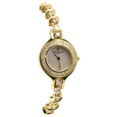 Baume & Mercier Ladies Yellow Gold Diamond Custom Bracelet quartz Wristwatch  