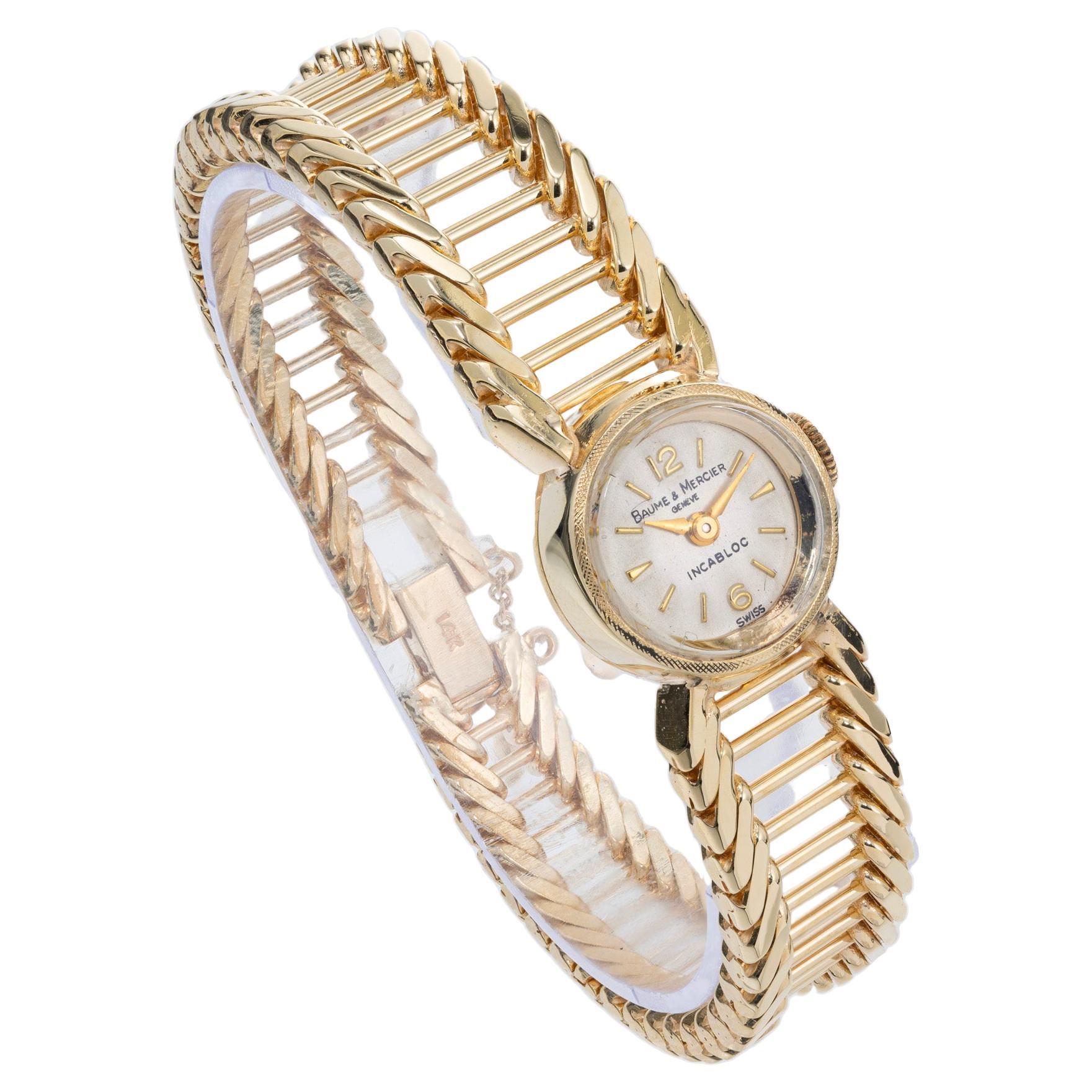 Damen Baume & Mercier 14k Gelbgold Handgelenk Uhr. Trueing Mitte des Jahrhunderts 1960er Jahre Stil Armbanduhr. 14k Gelbgold Bars, die abgestuft sind und mit Gelbgold Seil Stil Kanten umrahmt. Uhrwerk mit Handaufzug und 17 Juwelen. Alles original