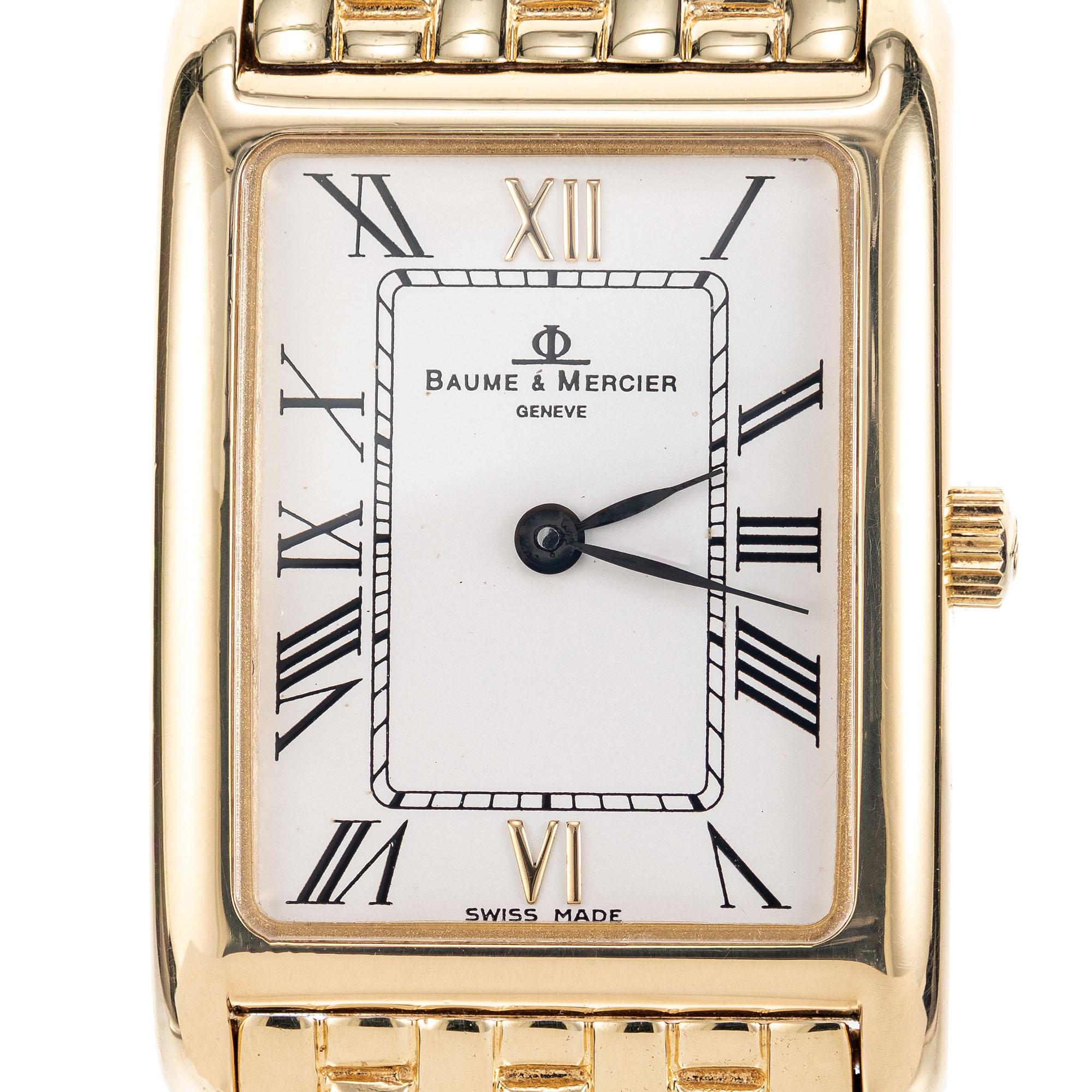 Baume & Mercier quarts tank wristwatch, 18k yellow gold with Panther style band. White dial with roman numerals. 6.5 inches long.

18k yellow gold
Length: 6.5 inches
Case length: 28.49mm
Case width: 19.59mm
Band width at case: 15mm
Case thickness: