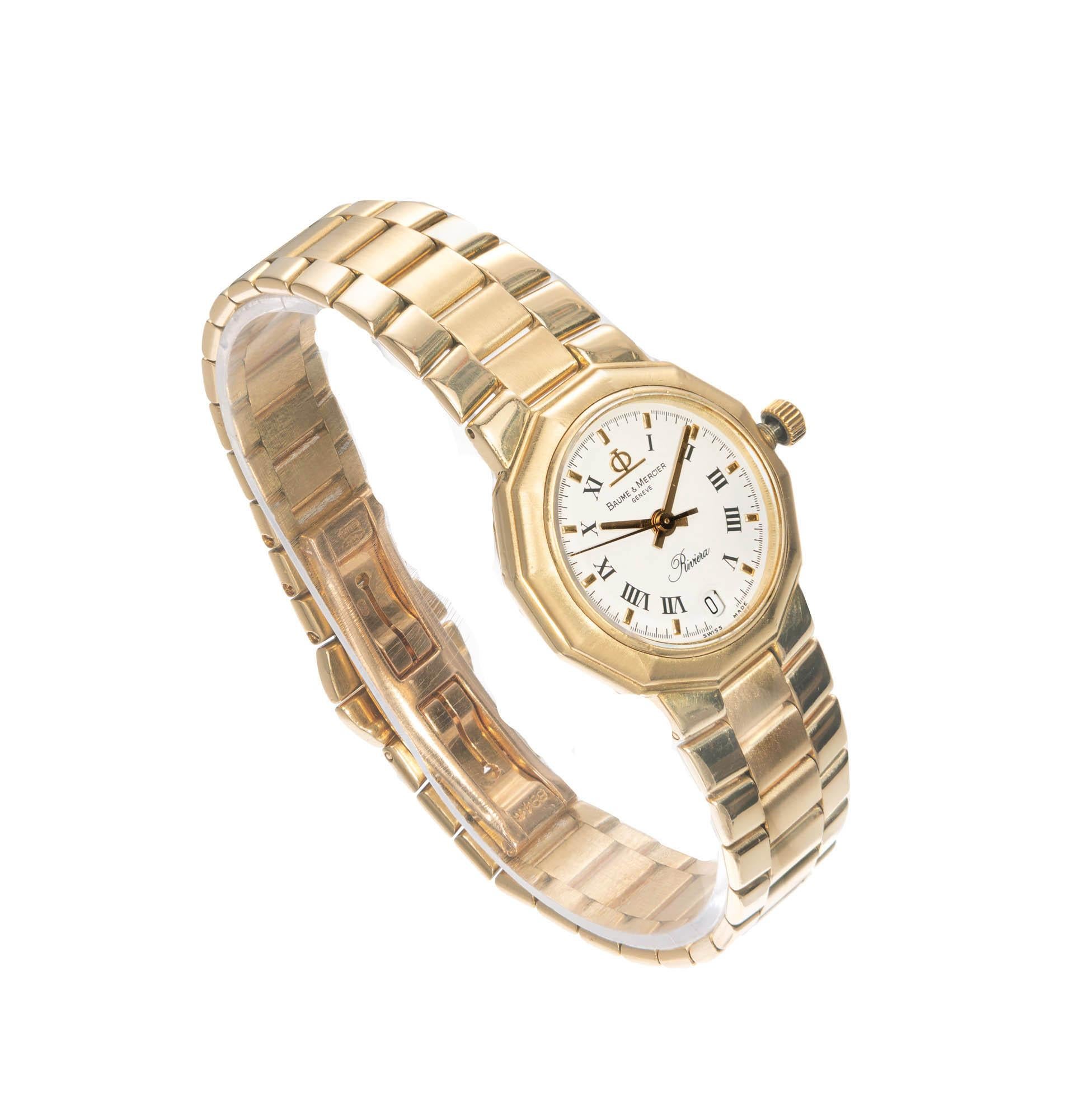 Baume & Mercier yellow gold riviera wristwatch. Solid 18k yellow gold case and band. Reliable Quartz movement, date.

Length: 29mm
Width: 24.8mm
Band width at case: 14mm
Case Thickness: 5.93mm
Band: 18k yellow gold
Crystal: sapphire
Dial: Eggshell