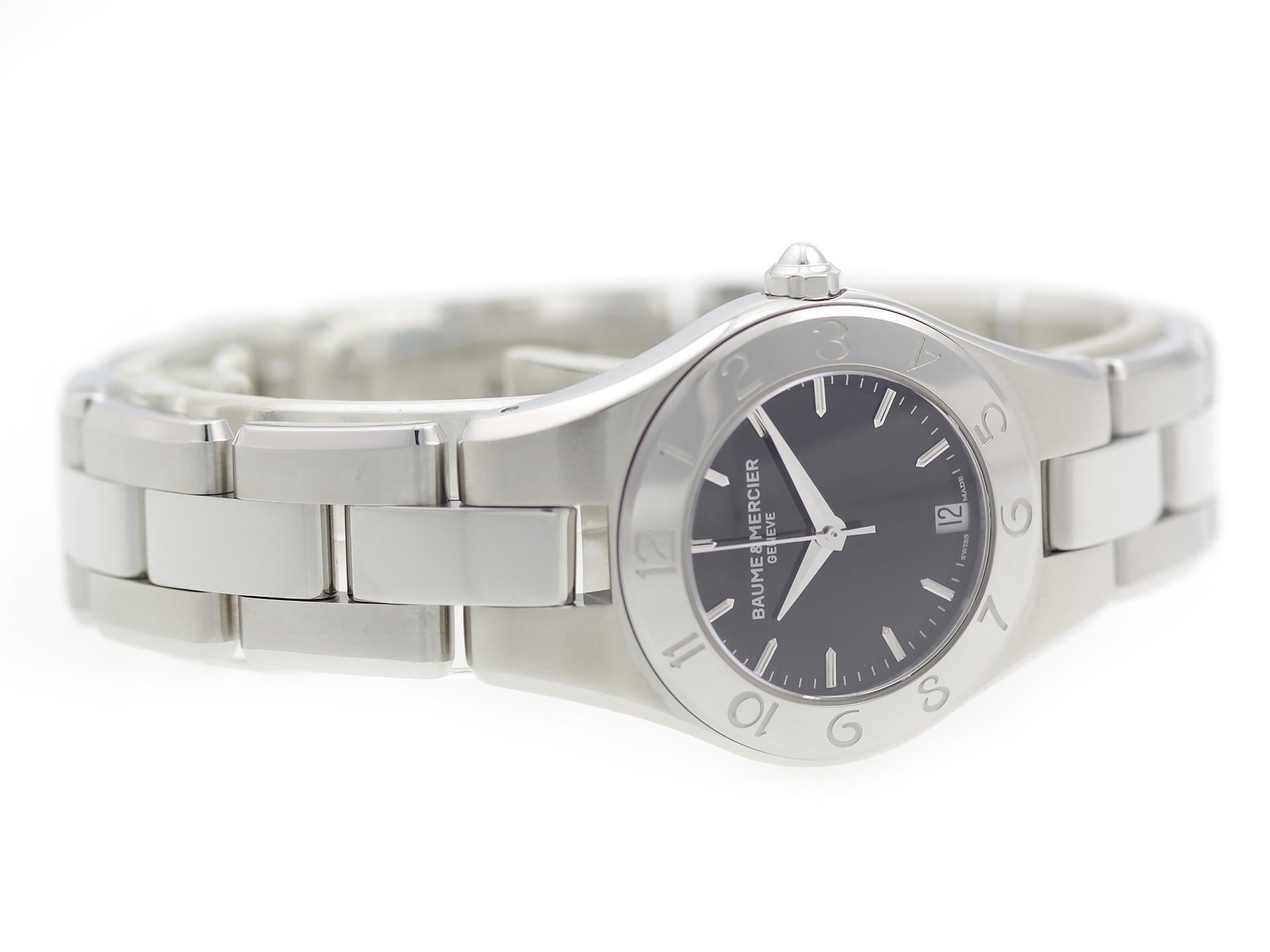 Stainless steel Baume & Mercier Linea MOA10010 watch, water resistance to 50m, with date and numeral bezel.

Watch	
Brand:	Baume & Mercier
Series:	Linea
Model #:	MOA10010
Gender:	Ladies’
Condition:	Excellent Display Model
Box/Papers:	Gift Box, 2