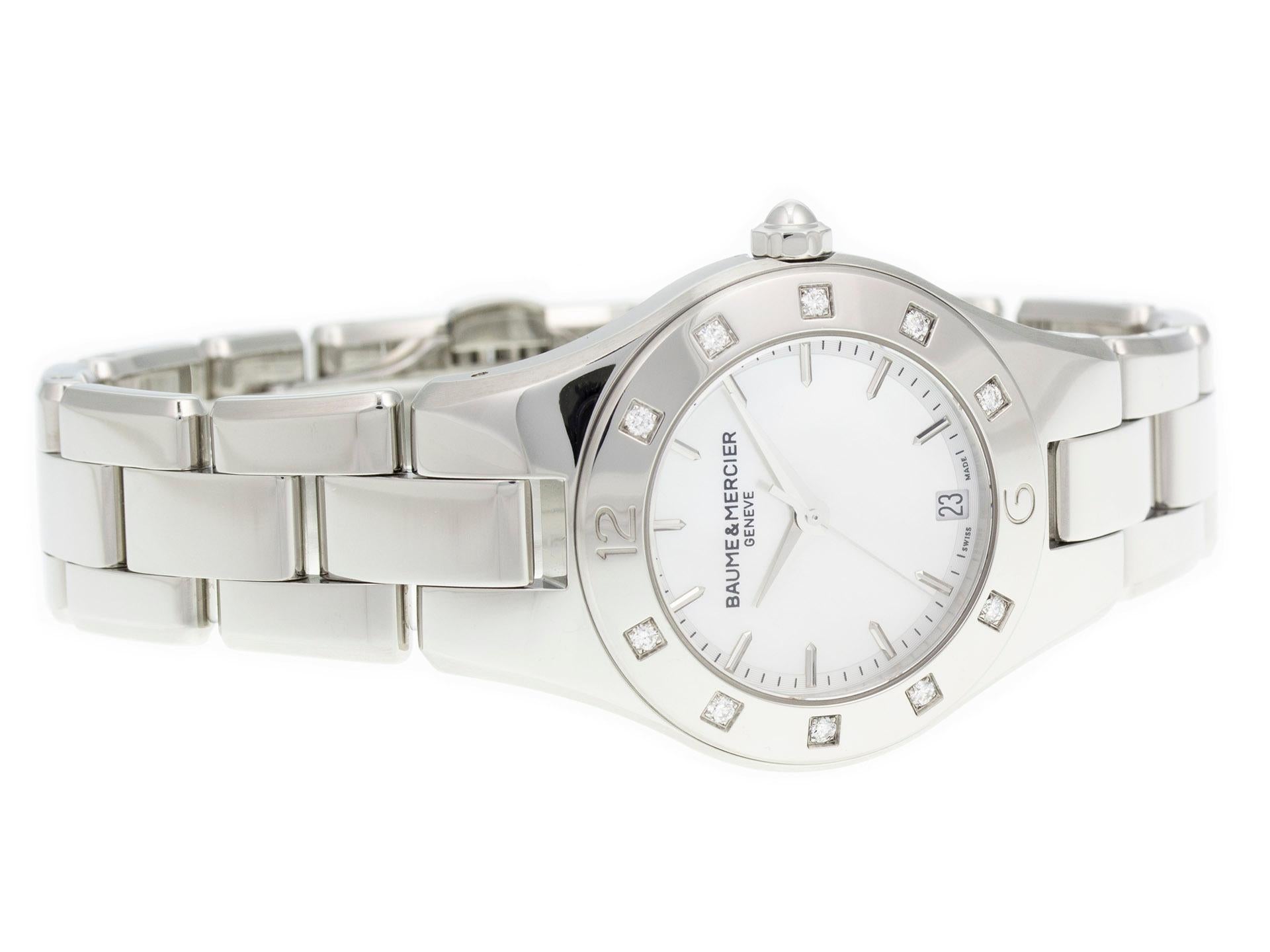 Stainless steel Baume & Mercier Linea MOA10071 watch, water resistant to 50m, with date and diamond bezel.
Watch	
Brand:	Baume & Mercier
Series:	Linea
Model #:	MOA10071
Gender:	Ladies’
Condition:	Great Display Model, Tiny Dings & Scratches on Bezel