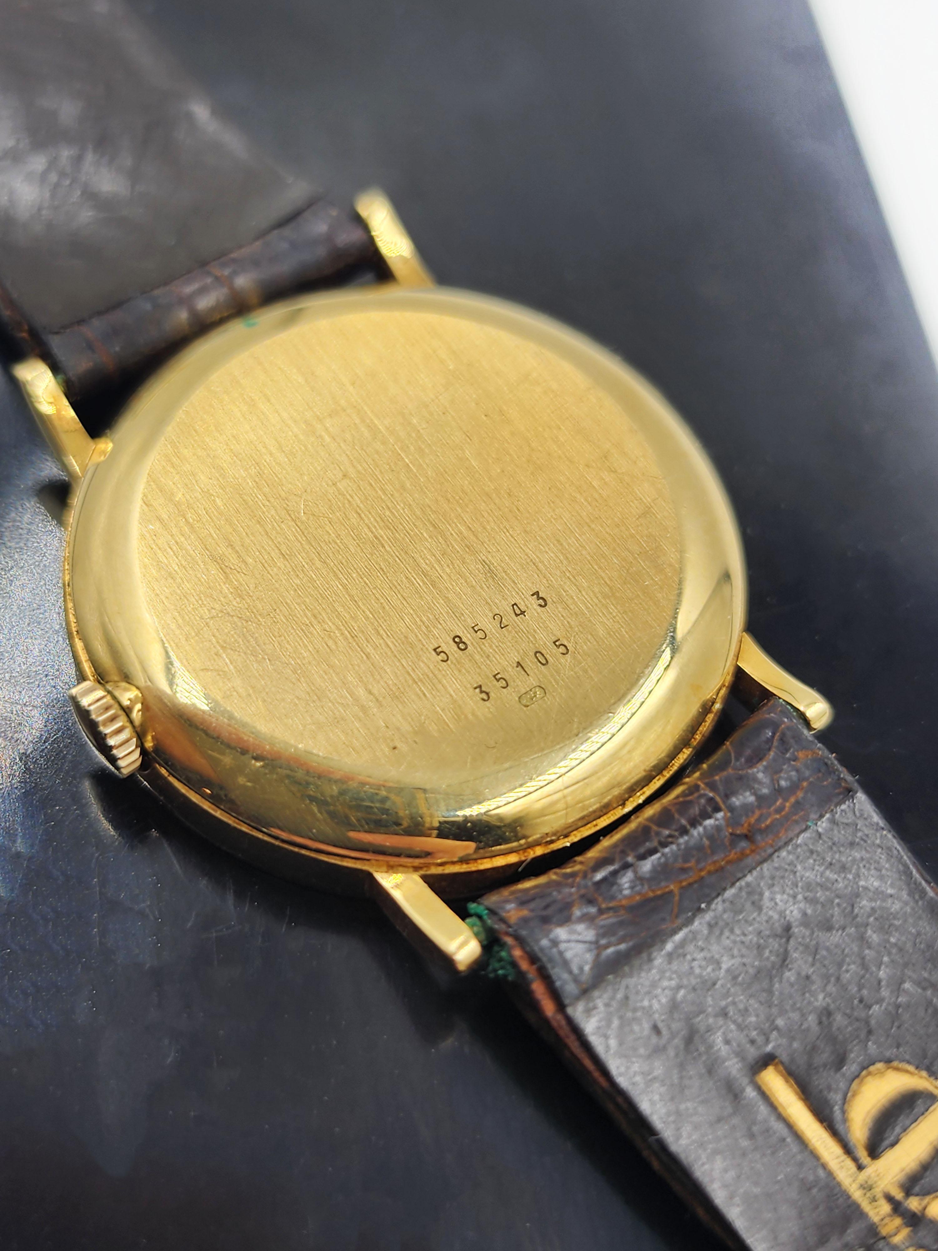 Baume & Mercier Men's Calendar Watch in 18 kt Gold Vintage In Good Condition For Sale In Autonomous City Buenos Aires, CABA