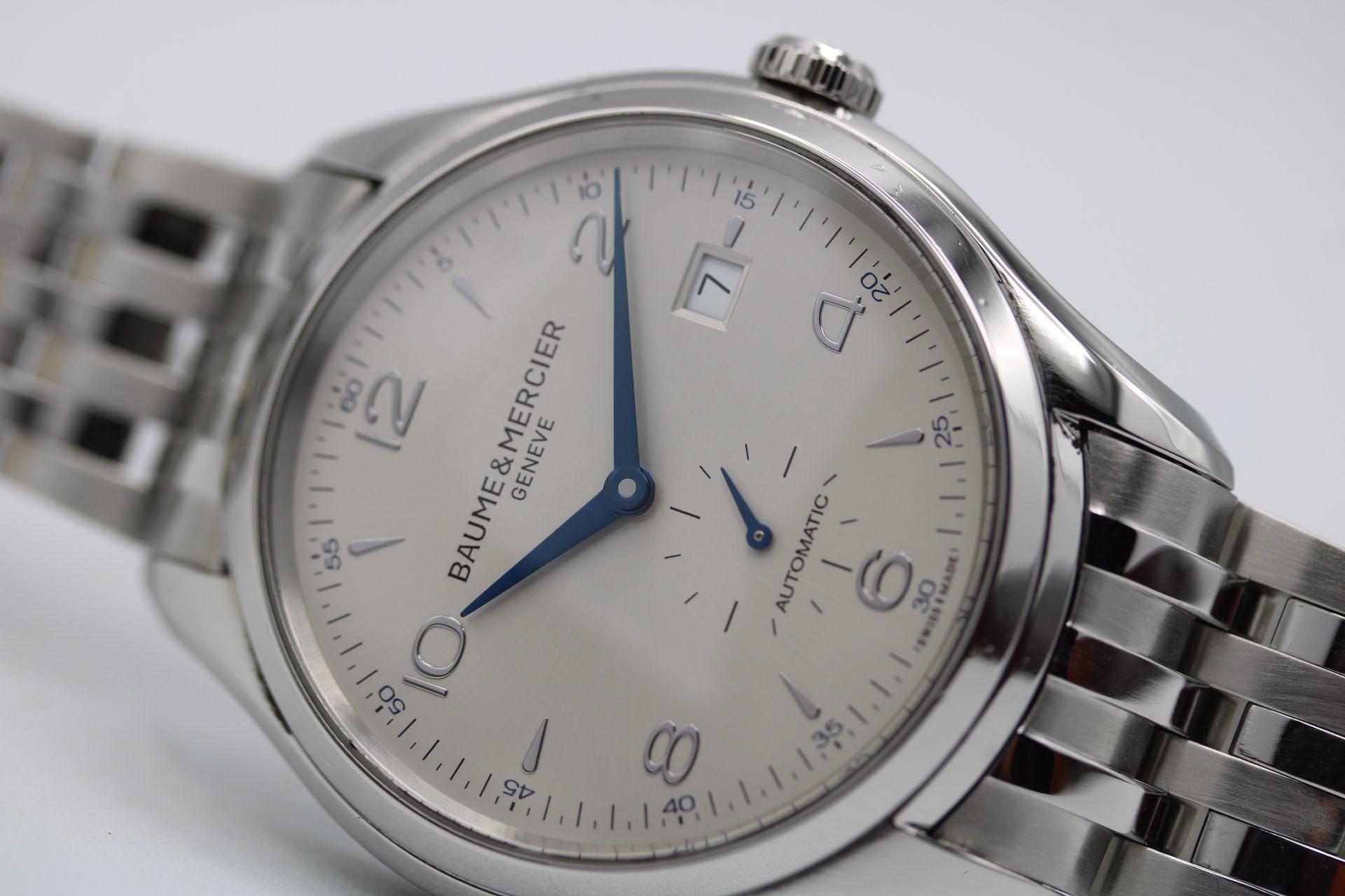 This Baume & Mercier Clifton is presented in excellent working order and condition available as complete full set including inner and outer boxes, manual and warranty card being dated December 2016.

This Baume & Mercier, model 65717, features a