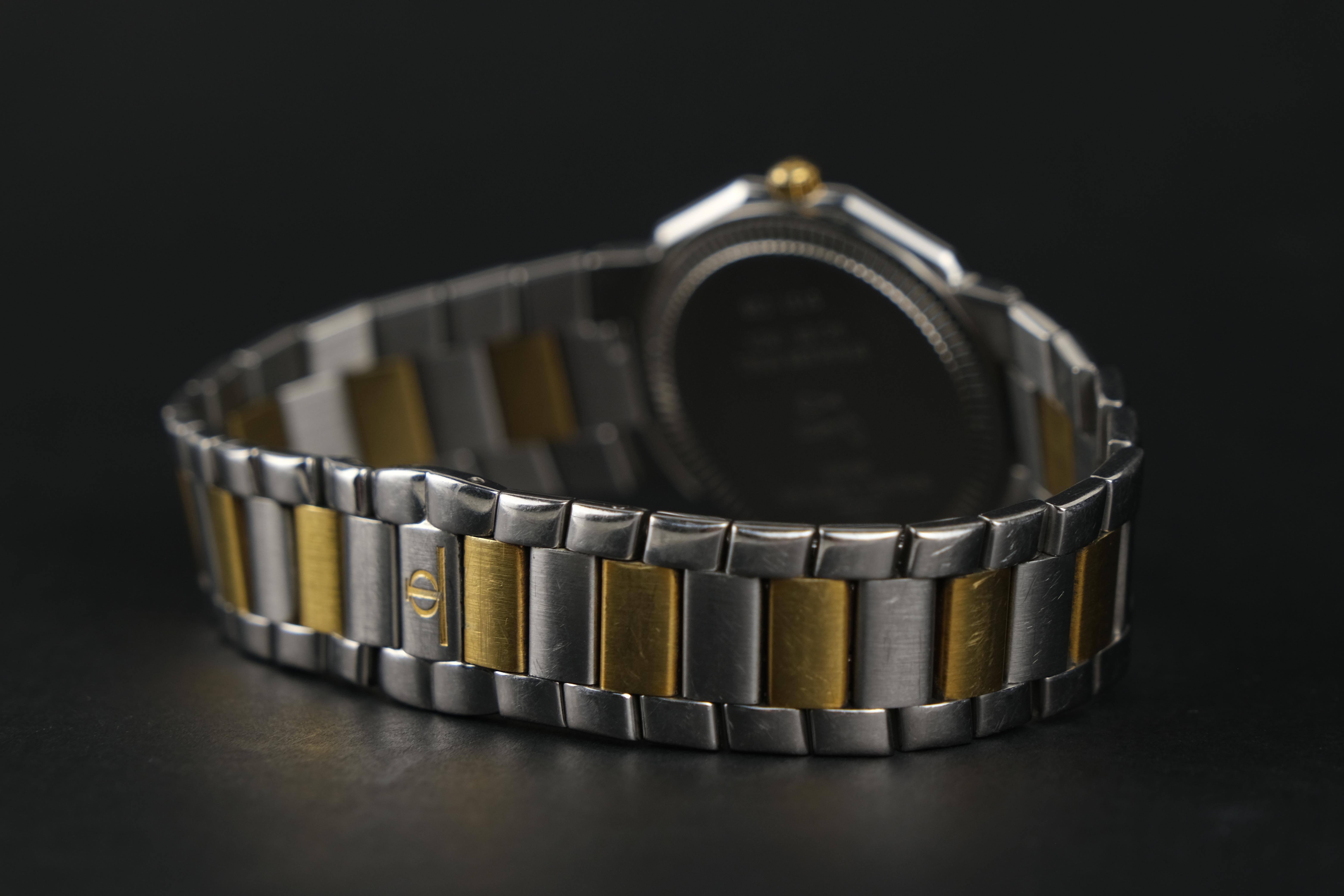 Women's or Men's Baume & Mercier Riviera 18 Karat Gold and Stainless Steel Quartz Wristwatch For Sale