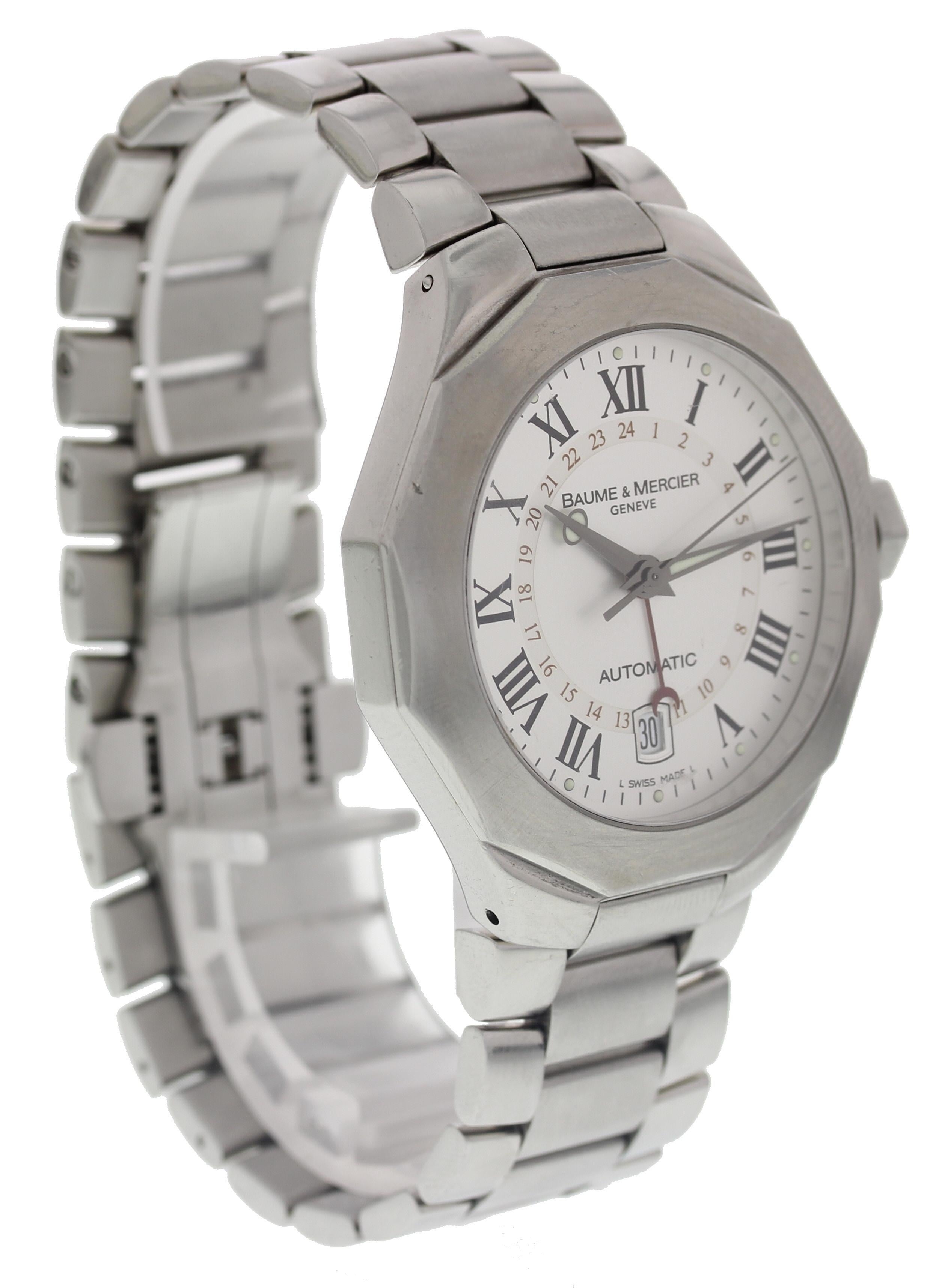 Men's Baume & Mercier Riviera. Stainless steel 40mm case. Stainless steel bracelet will fit a 7.5 inch wrist. Silver dial with roman numeral hour markers, date aperture at 6 o'clock, luminous hands, and 24 hour hand indicator. Automatic movement.