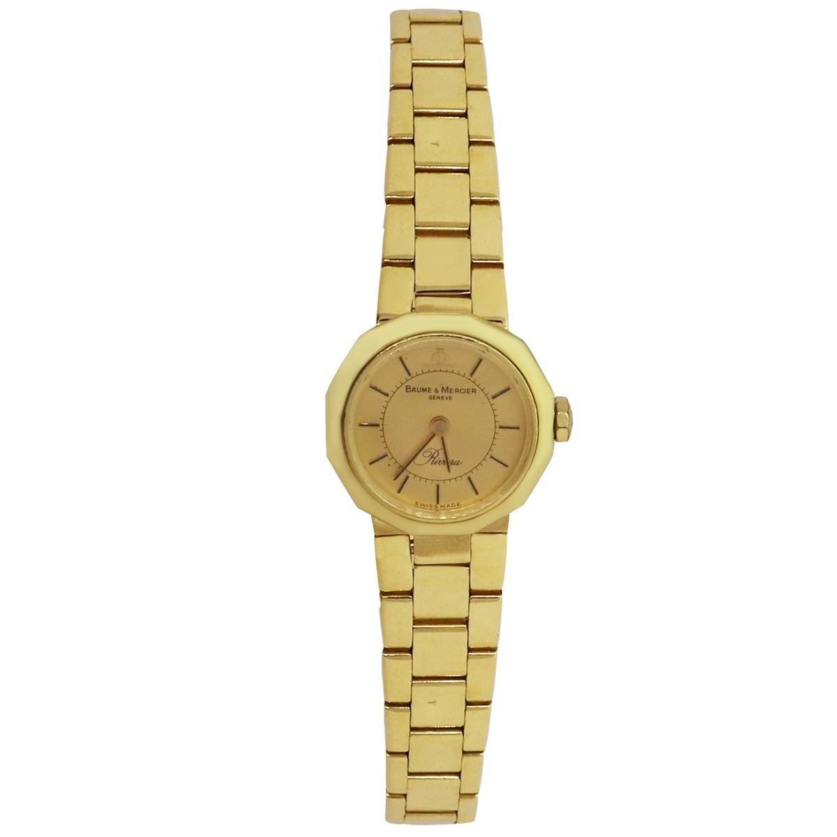 Brand: Baume & Mercier
Model: Riviera
Material: 18k Yellow Gold
Dial: Champagne dial with yellow hands and markers
Bezel: Fixed smooth 18k yellow gold bezel
Case Measurements: 24mm
Bracelet: Yellow gold link bracelet
Clasp: Fold over lock yellow