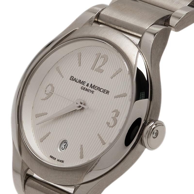 This pretty watch explains why the Baume & Mercier wristwatches are so popular! Crafted from stainless steel, this Ilea watch houses a white dial with four Arabic numerals and silver-tone hands. Water resistant up to 50M, the timepiece houses a