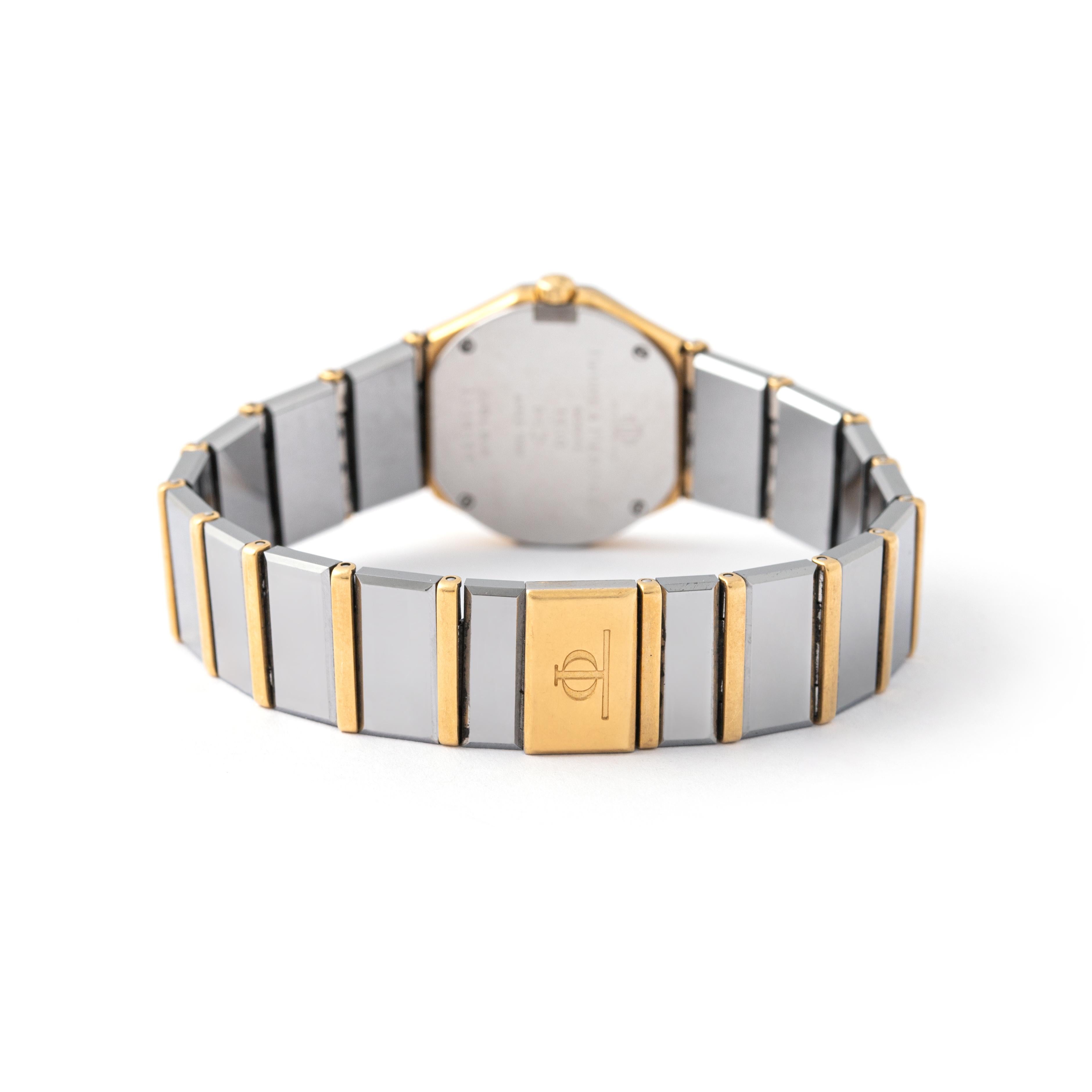 Baume & Mercier, montre-bracelet vintage d'avant-garde en acier inoxydable en vente 3