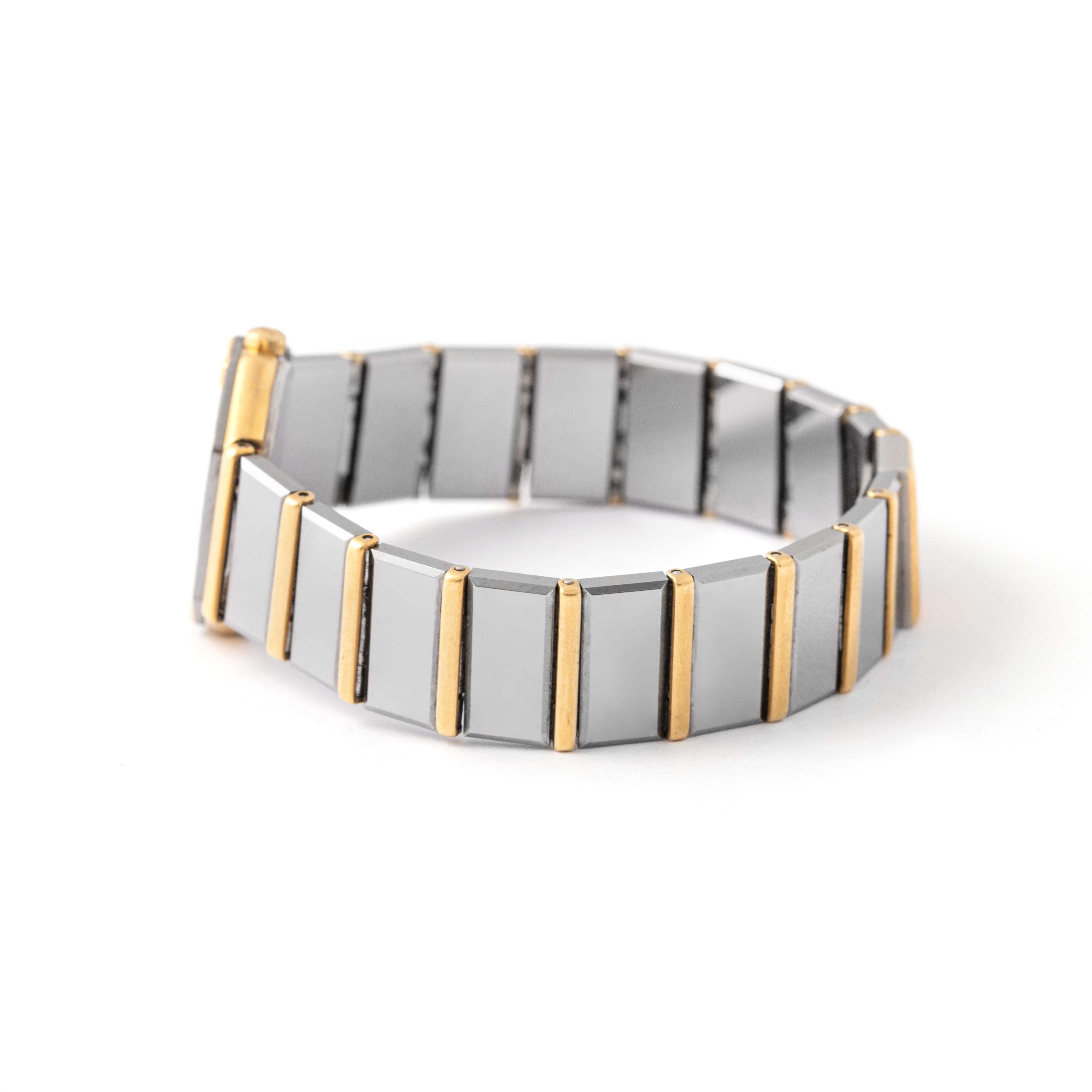 Baume & Mercier, montre-bracelet vintage d'avant-garde en acier inoxydable en vente 4