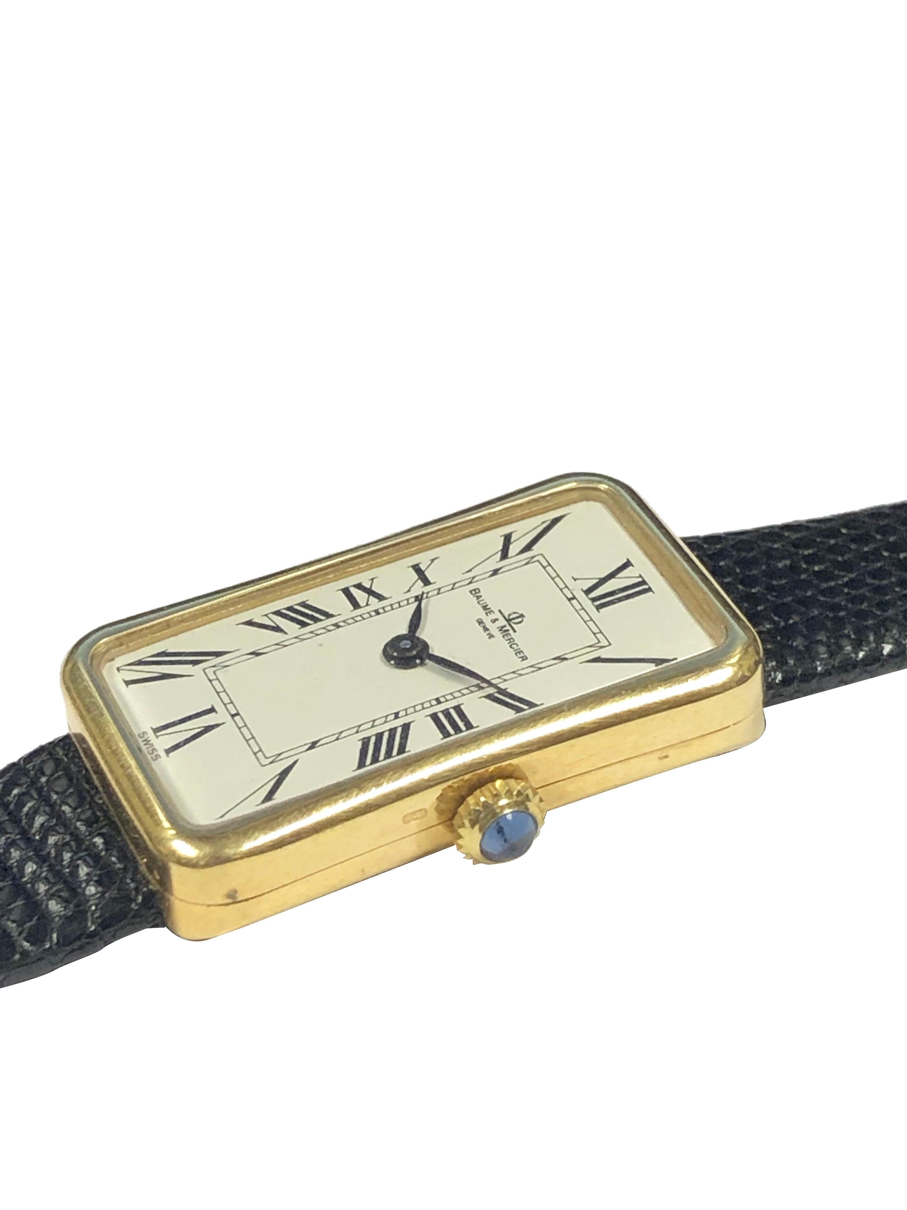 Owned and worn by Hollywood Royalty / Icon Jerry Lewis is this Circa 1960s Baume & Mercier Wrist Watch, 31 x 17 M.M. 18K Yellow Gold 2 Piece Rectangular case with Slight Convex curved sides and lug ends hidden under the case. Sapphire set Crown, 17