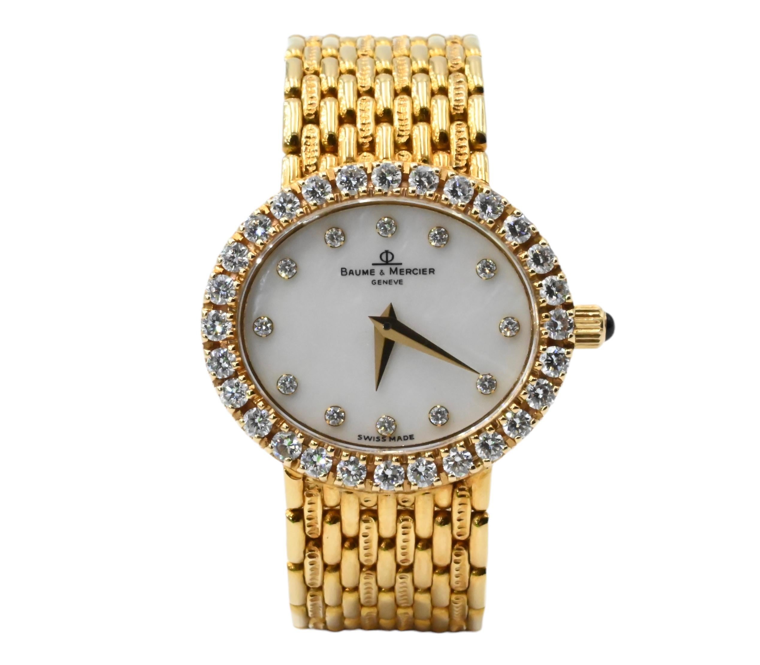 Baume & Mericer 18K Yellow Gold Diamond Watch Model 18310 9

Features:
•MODEL NO: 18210 9
•MOVEMENT: JEWELED QUARTZ MOVEMENT 
•CASE MATERIAL: SOLID 18K YELLOW GOLD
•CONDITION: LIKE NEW EXCELLENT PRE-OWNED
•CASE MEASUREMENTS: 24.5MM X 21.5 MM (NOT