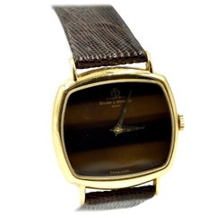 Baume & Mercier Yellow Gold Tiger Eye Dial Vintage manual wind Wristwatch 