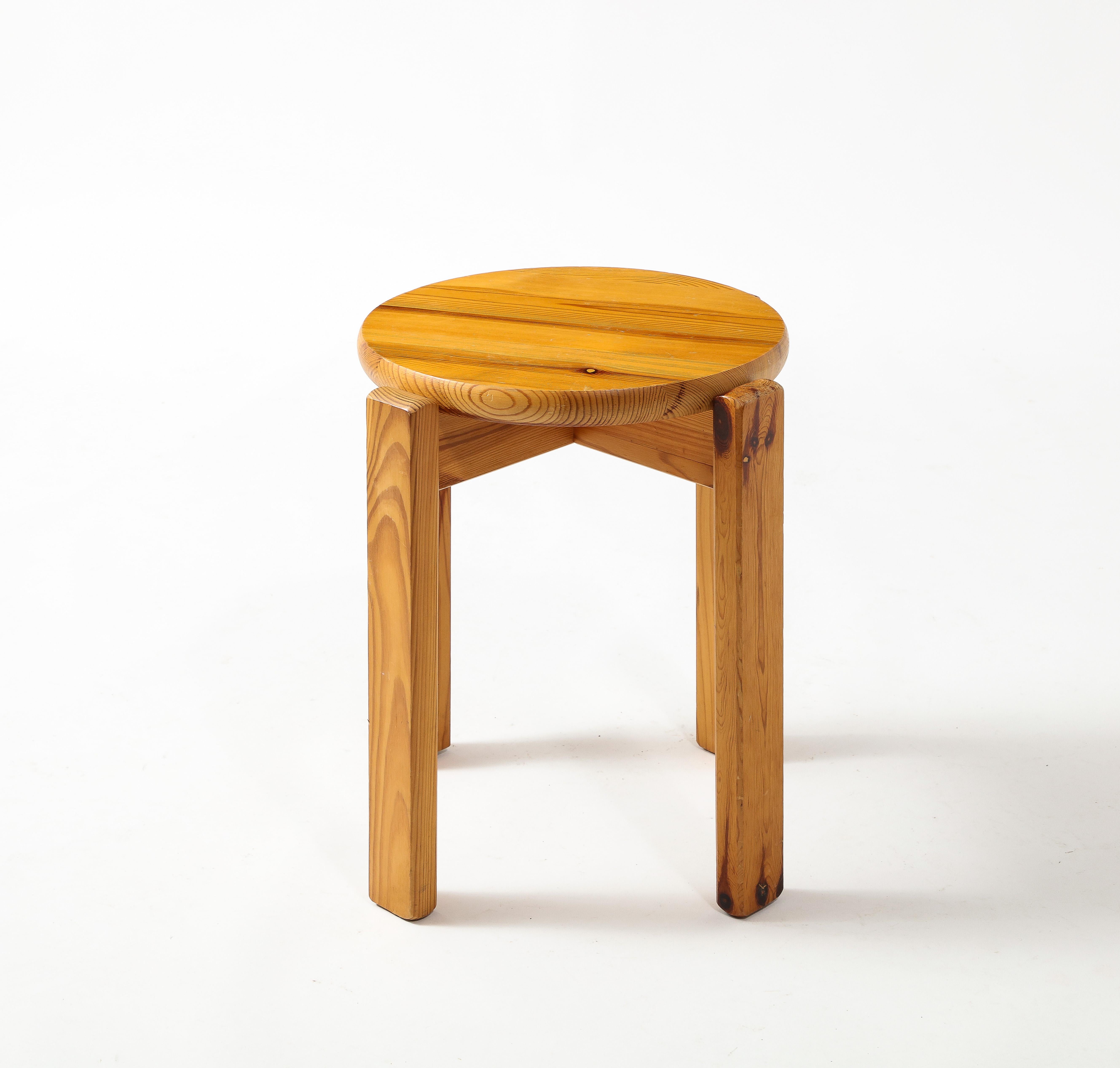 Pine Stool with four legs excentered from the seat.