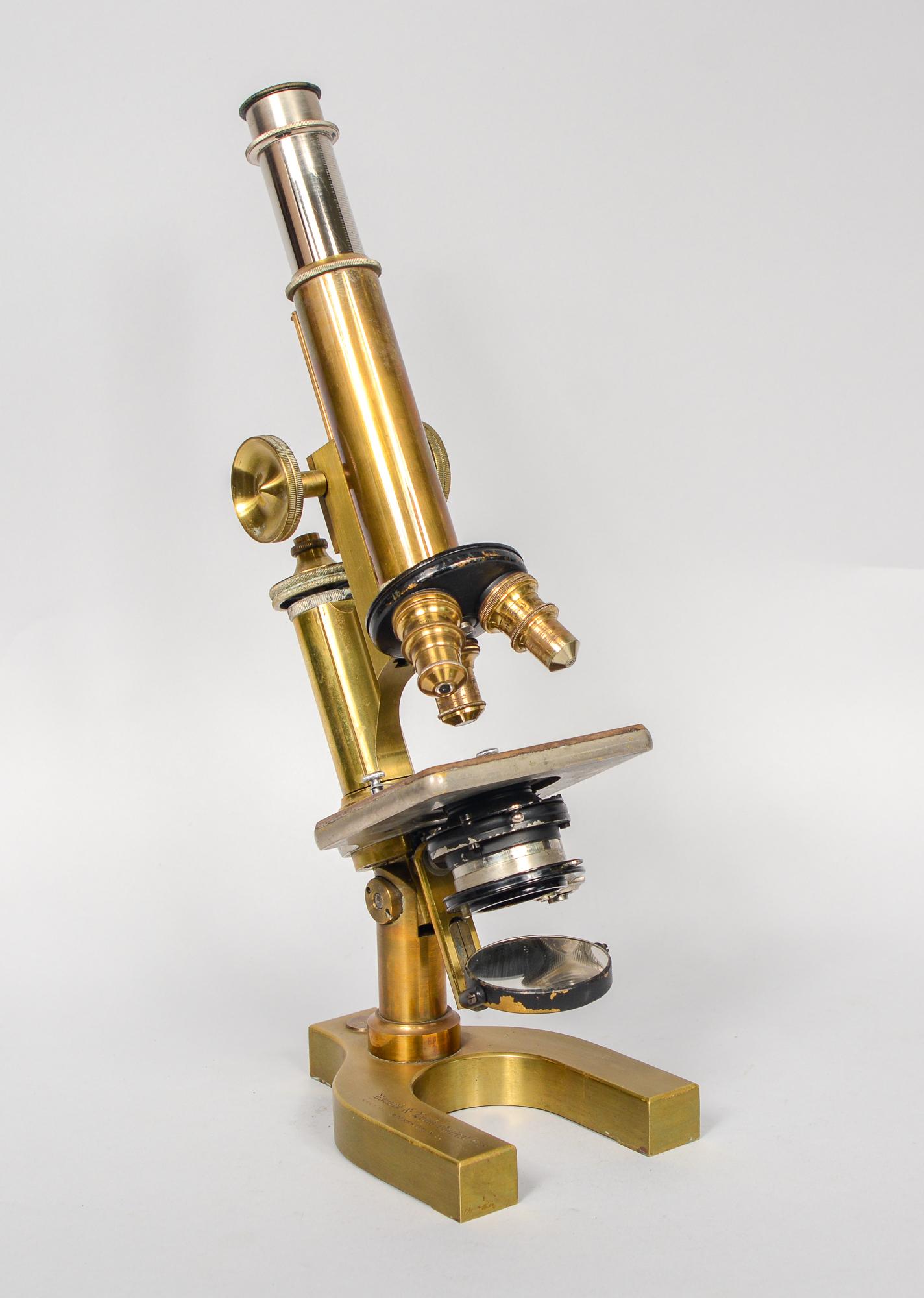 Brass Bausch and Lomb microscope. This has a patent date of February 16, 1897. This microscope has three objectives. The box this is in is probably not the correct one. The dimensions listed are for the box. The microscope is 425 inches deep, 6