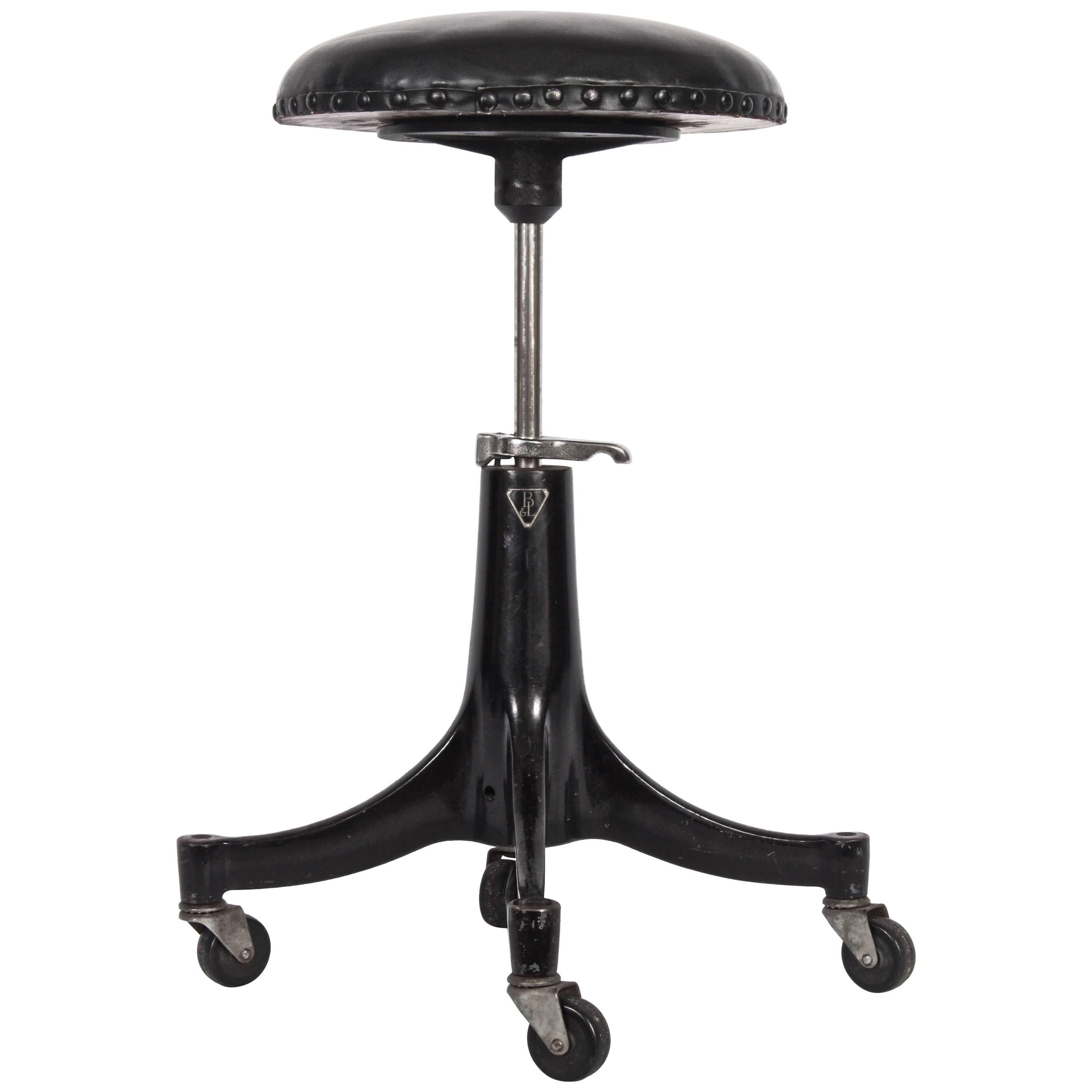 Bausch & Lomb Machine Age Adjusting Cushioned Black Iron Rolling Stool, C. 1930s