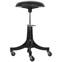 Vintage Bausch & Lomb Machine Age Adjusting Cushioned Black Iron Rolling Stool, C. 1930s