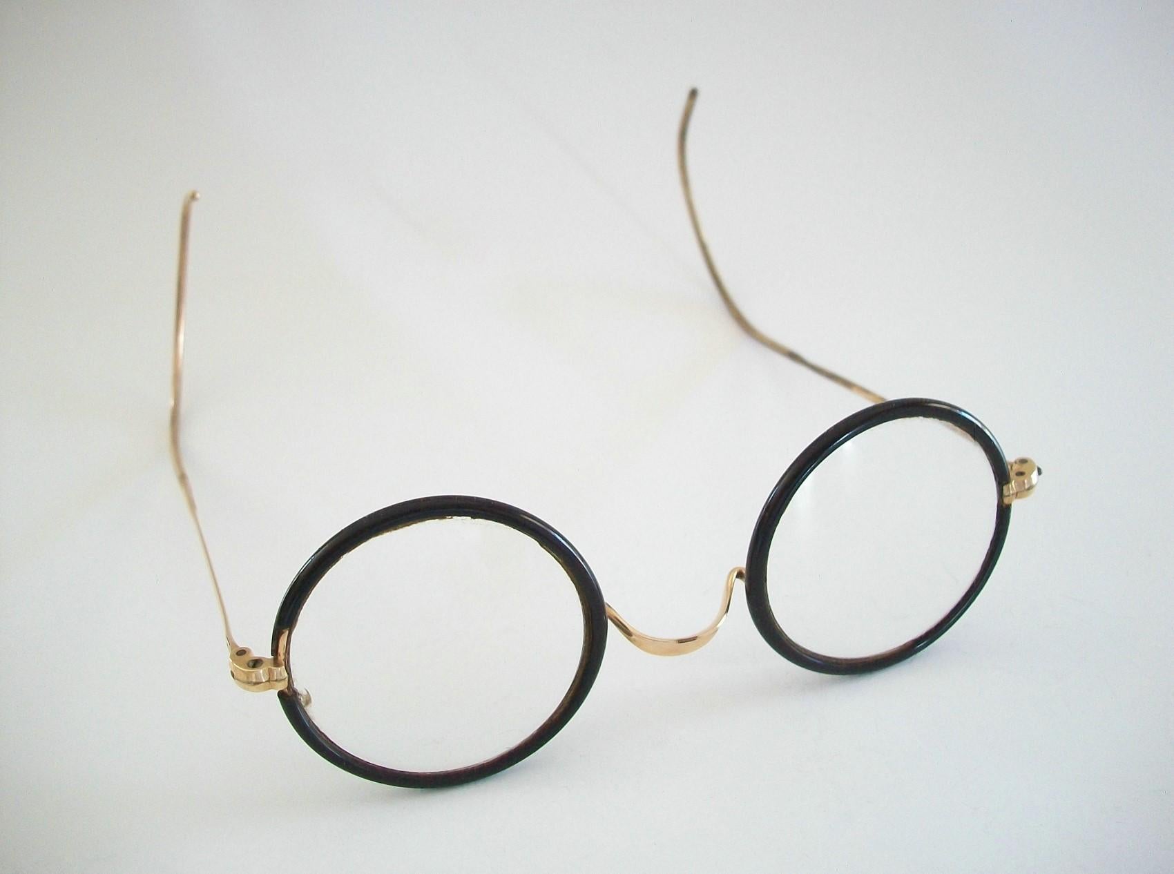black rimmed glasses