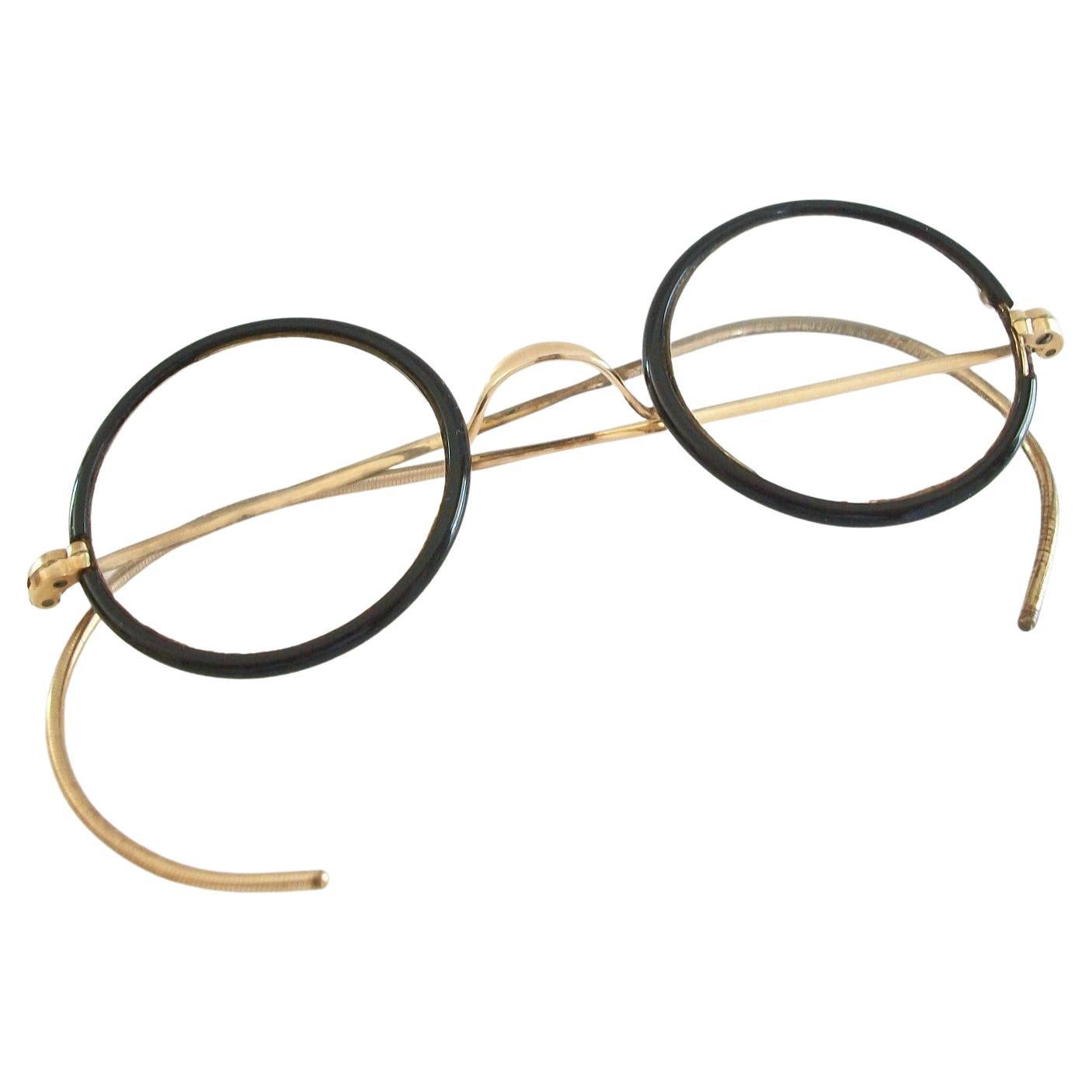 Bausch & Lomb, Vintage Black Rim & Gold Child's Eyeglasses, Canada, circa 1940s For Sale