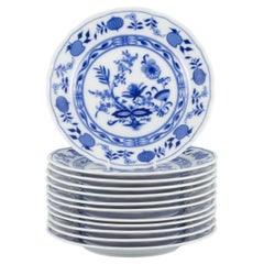 Bavaria, Germany. Set of twelve porcelain plates, Blue Onion pattern.