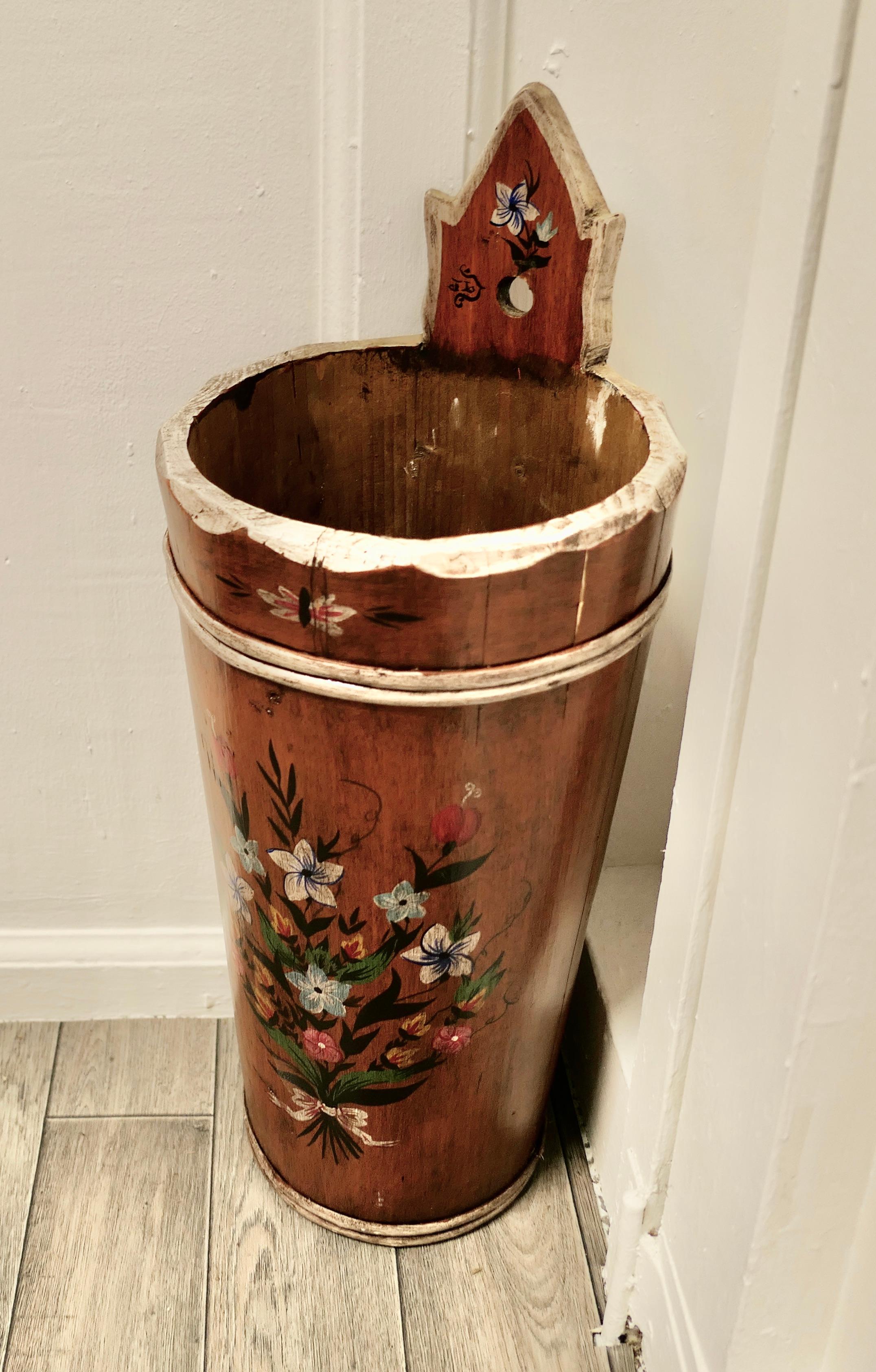 Bavarian Folk art painted stick stand, umbrella stand

This good looking piece it is conical in shape and decorated with flowers, the artist has signed this piece “J L”
The stand is made in pine and has a hole by which it could be fixed to the