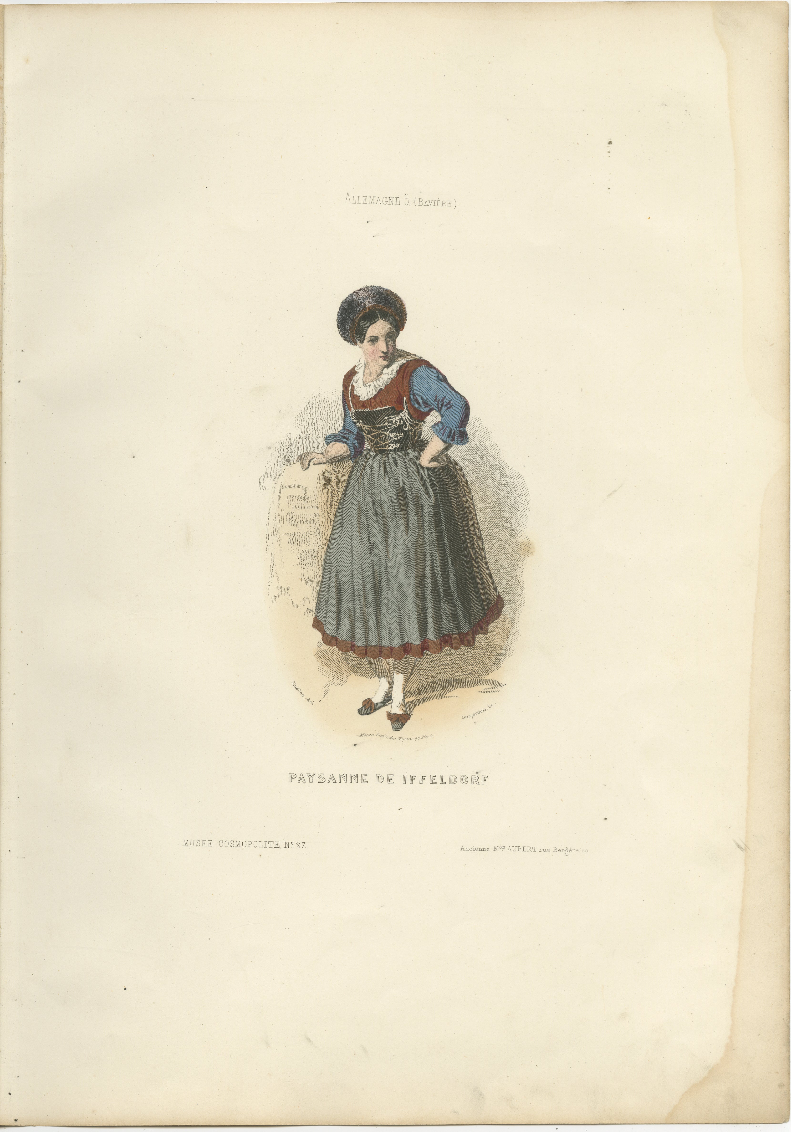 Bavarian Peasant Woman Print Iffeldorf Germany 1853 by Compte-Calix – Hand-Colored Lithograph

This charming antique print depicts a peasant woman (Paysanne) from Iffeldorf in Bavaria, Germany. Created by François Claudius Compte-Calix, it was