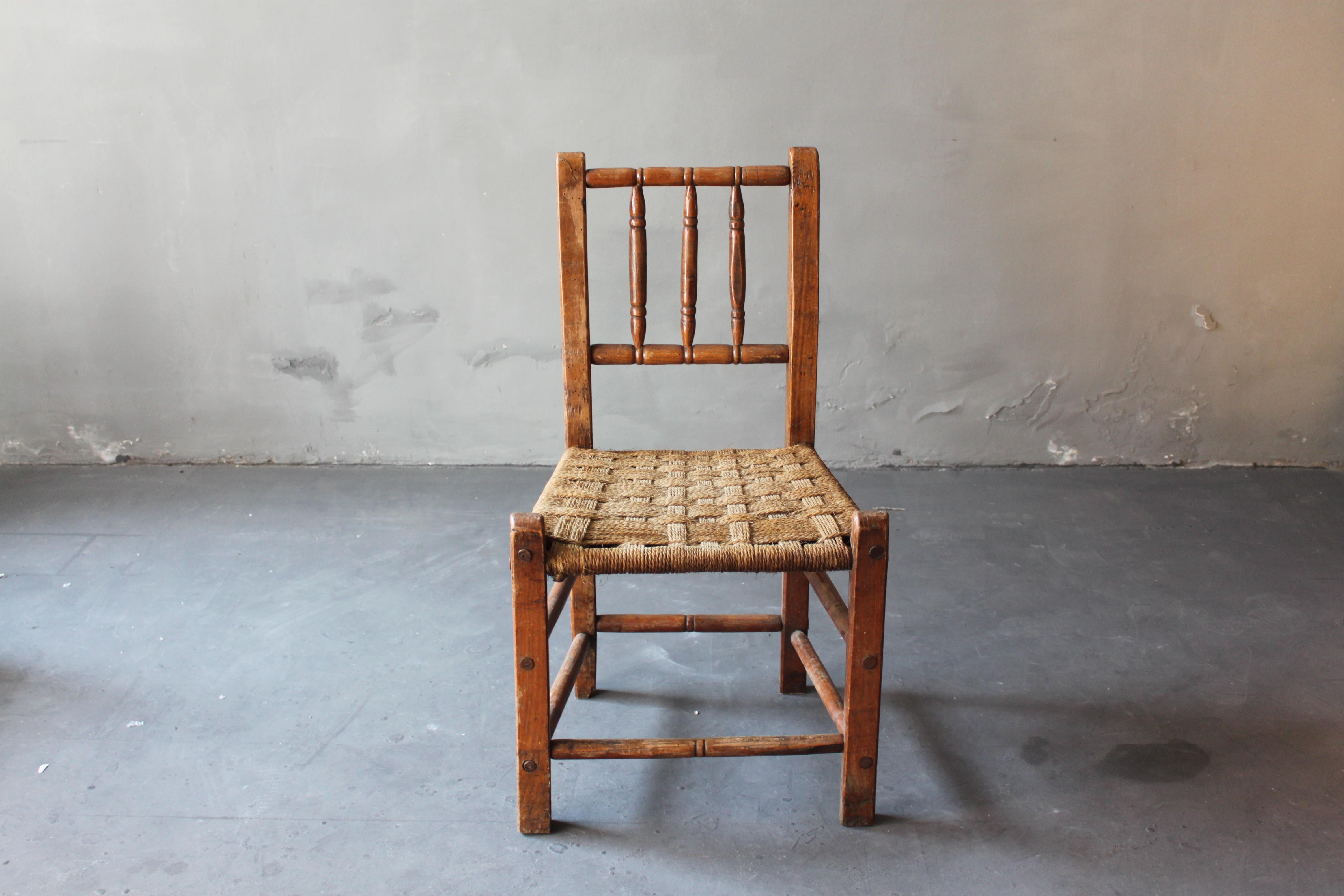 Bavarian Wicker chair from Stephanskirchen, used as a hallway chair. Handmade and stable, ca. 1900. The wood tells a beautiful story of its age and the craftsmenship that was different than todays craftsmenship. Wicker chairs has been famous not