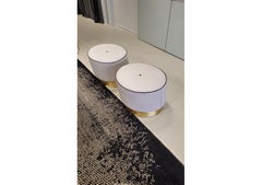 A Pair of Anais Texture Leather Brass Base Ottomans by Draga & Aurel for Baxter