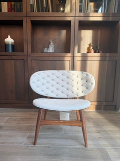 Poltrona Baxter Dalma di Draga & Aurel, in pelle e Wood