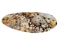 Tavolo Baxter Lagos Piano in granito Patagonia Gambe in ottone anticato