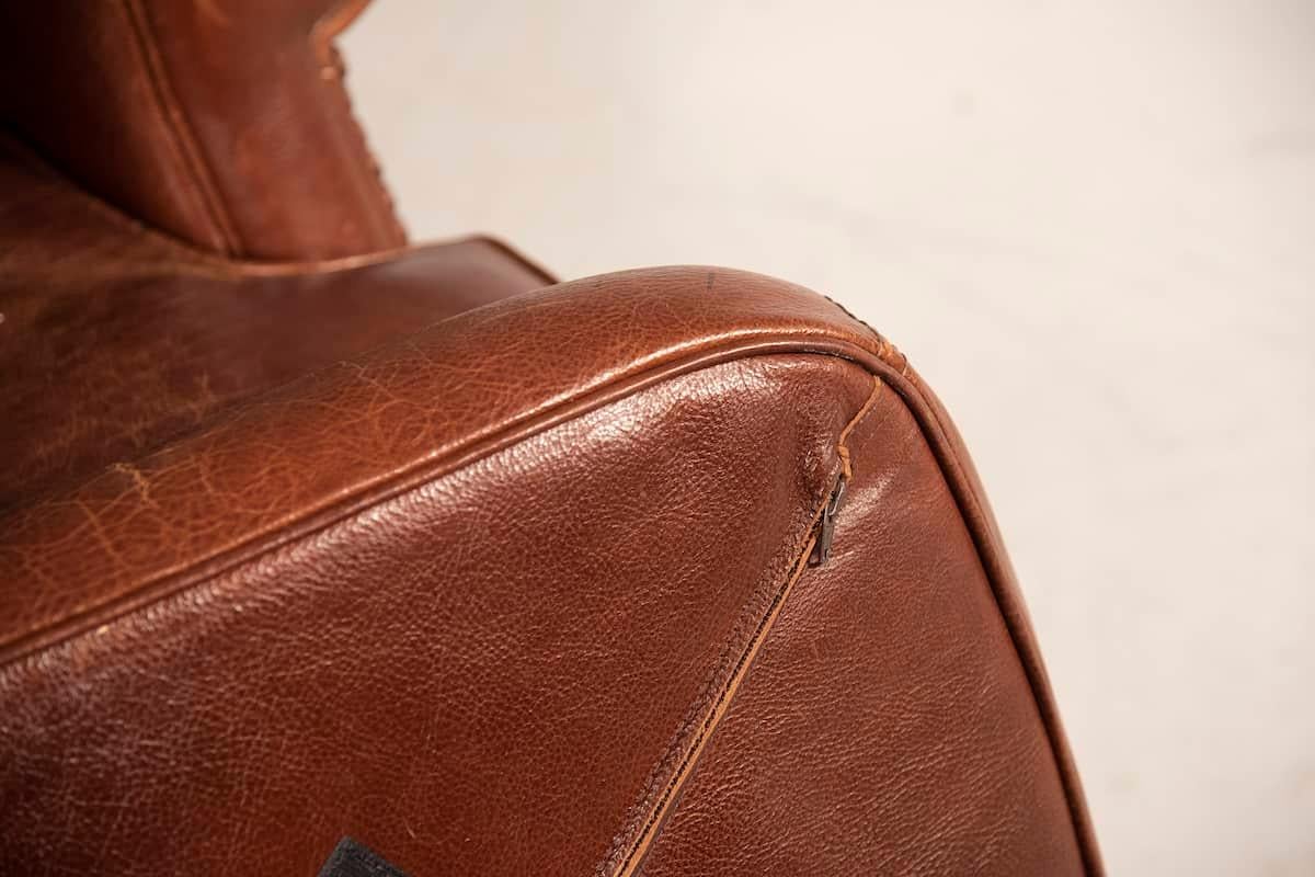Leather Baxter Set of Armchair and Ottoman For Sale