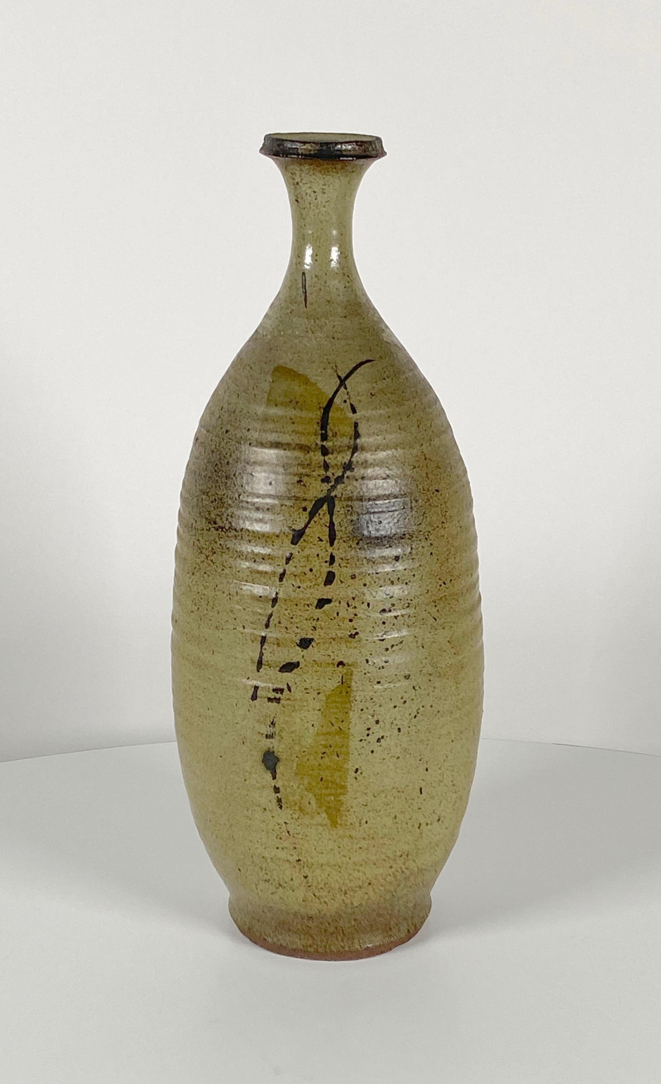 Slender tall ceramic vessel with glaze design embellishment by Bay Area potter Roy Walker (1910-2006). Student of Glen Lukens, his work was influenced by the ceramic artists of Japan. Walker received many awards over his lifetime, had exhibitions at