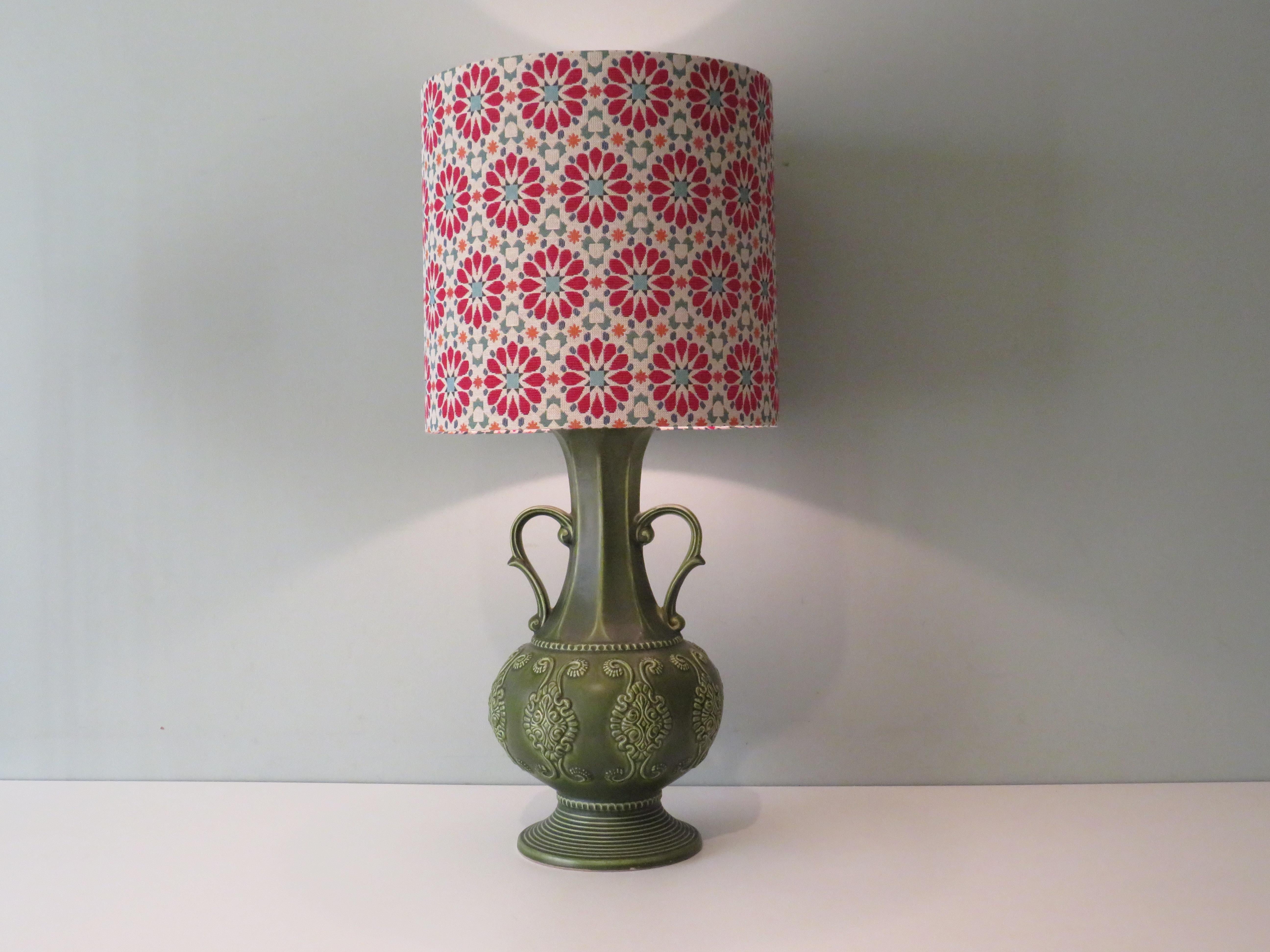 Large green ceramic table lamp produced by Bay Keramic studio, West-Germany 1960s.
The lamp is equipped with a new, handmade lampshade made of gobelin fabric and 1 E 27 fitting.
Dimensions:
Lamp base: height 51 cm, diameter 23 cm
Lampshade: