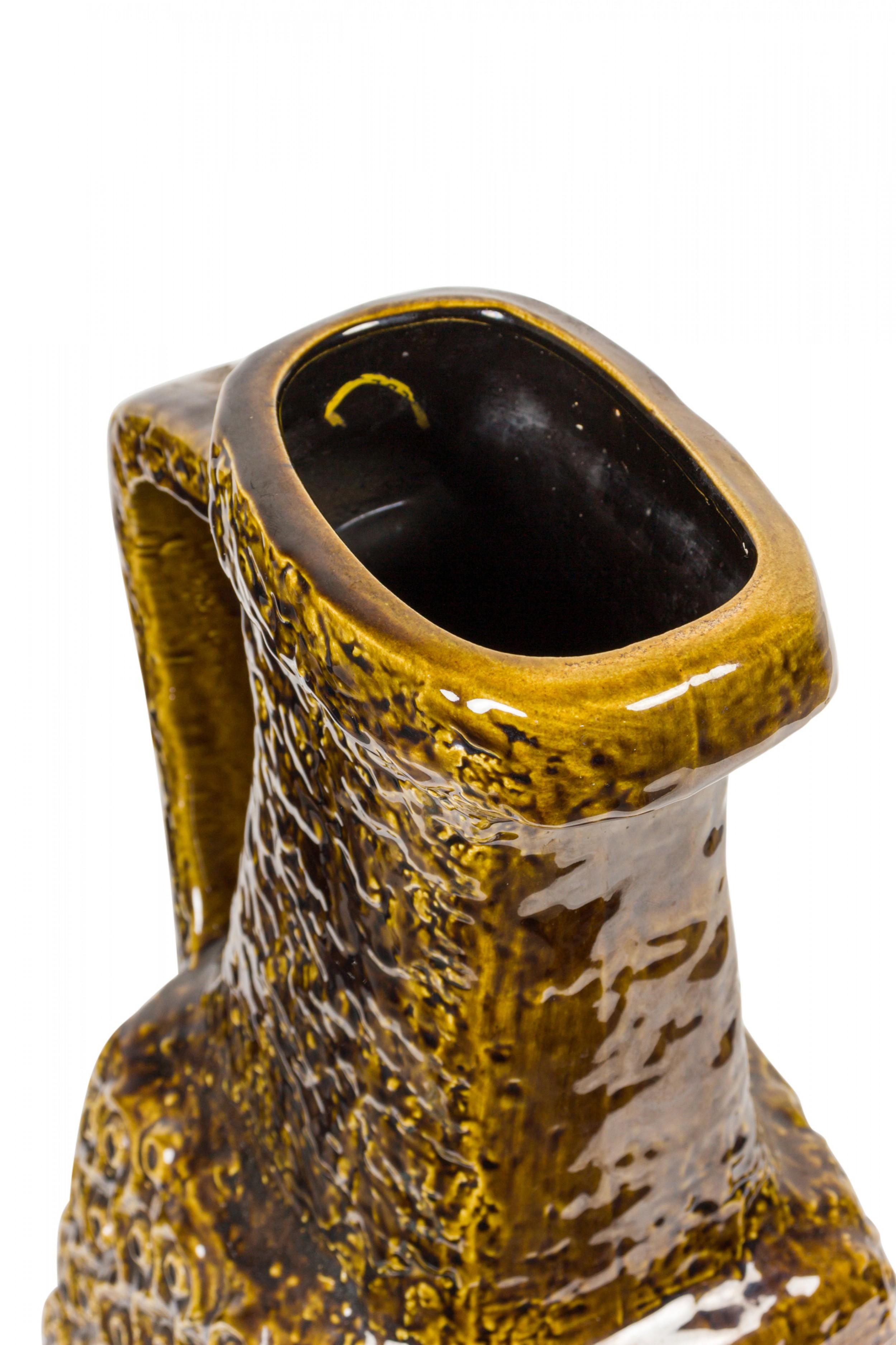 West German mid-century square base handled ceramic vase with a raised abstract nesting circle design around the base and a mottle black and yellow glaze. (BAY KERAMIK, mark on bottom, BAY W. GERMANY 265-40).