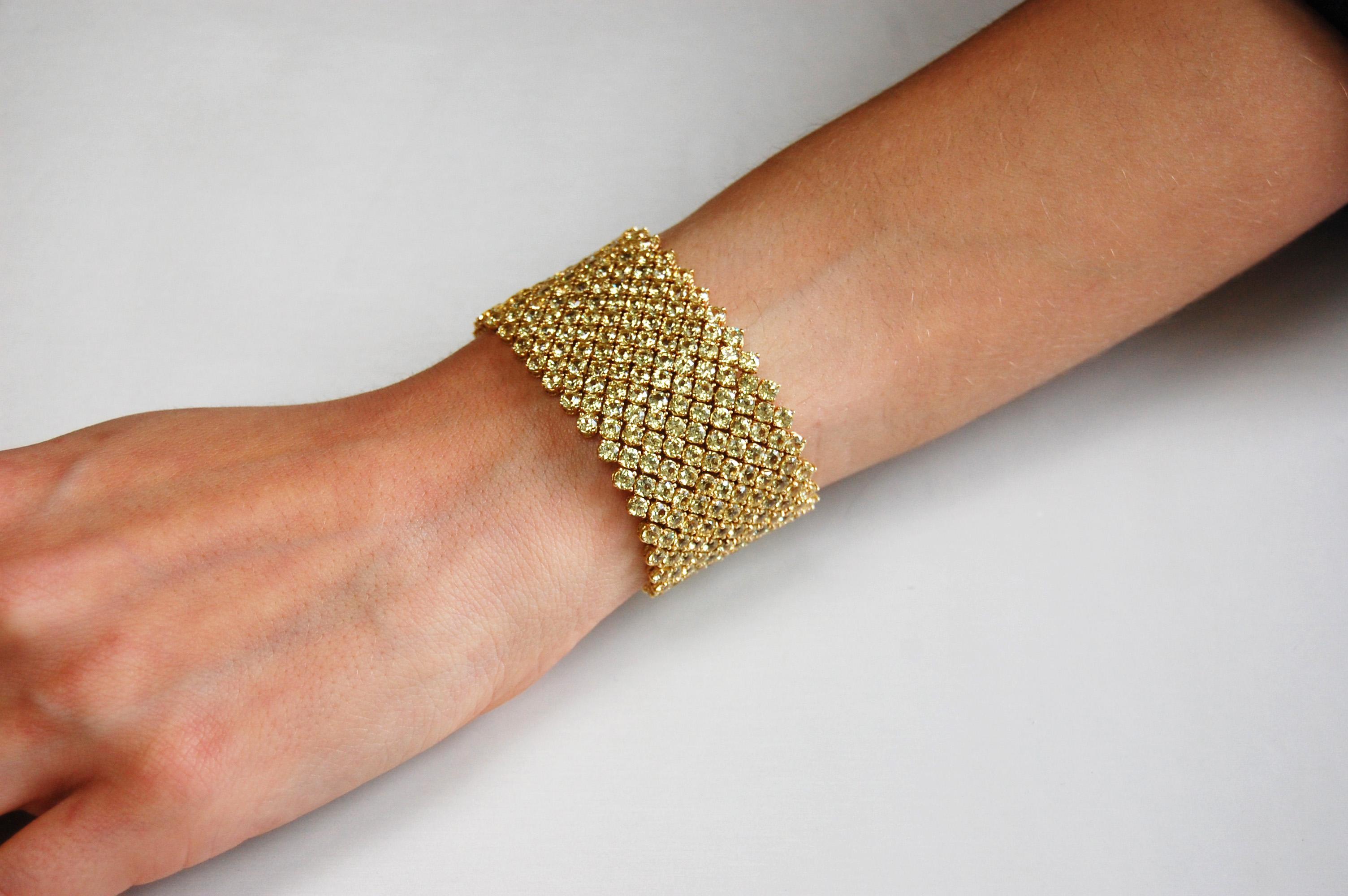 A spectacular bracelet comprised of 494 perfectly matched round brilliant-cut natural unheated yellow sapphires weighing 68.61 carats total, certified by C.Dunaigre, set in a very flexible 18kt yellow gold mesh design.

The Monochrome Collection by