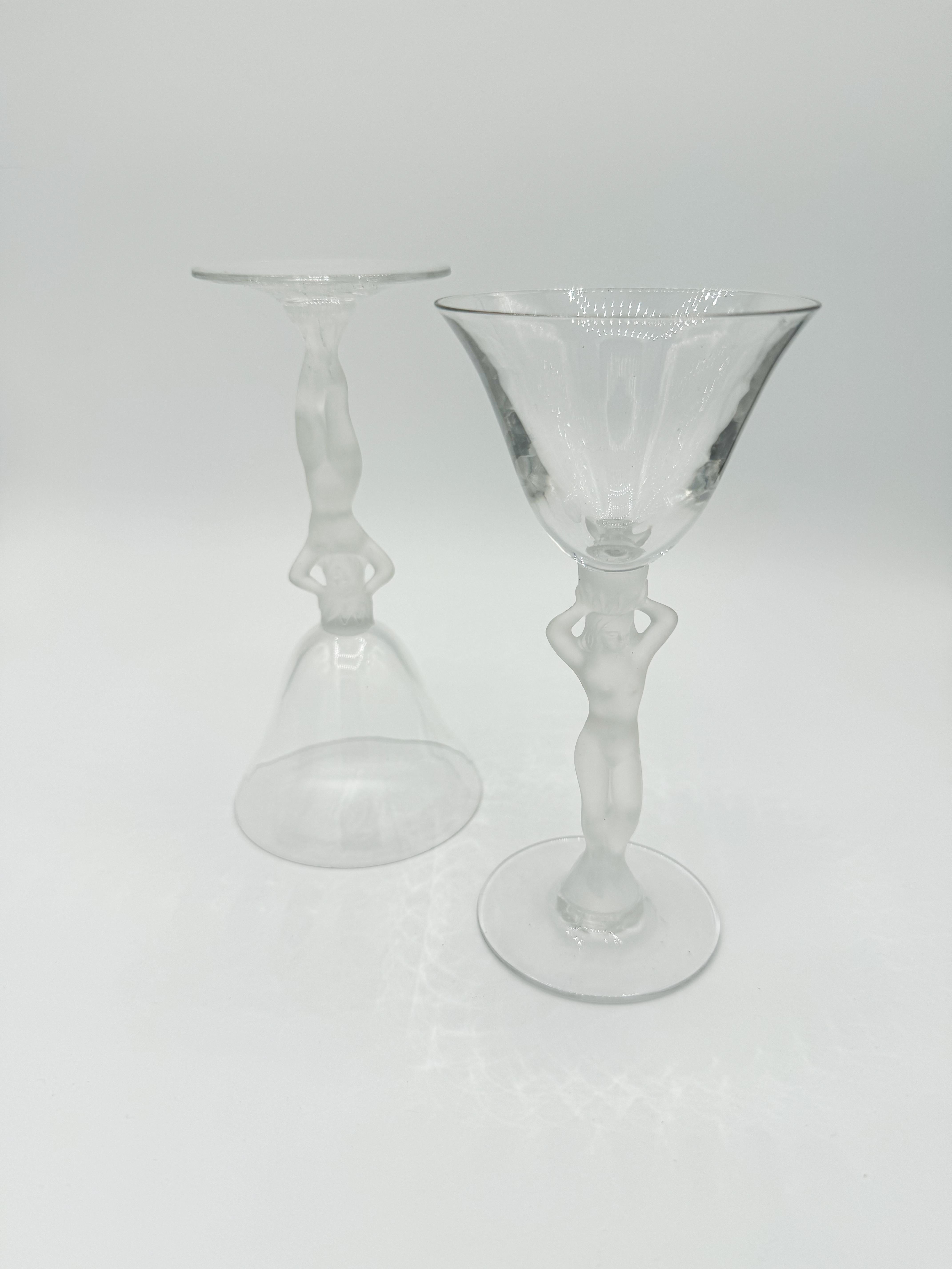 Enhance your glassware collection with this exquisite pair of Bayel France Crystal Frosted Nude Bacchus Glasses. Crafted from high-quality crystal, these glasses feature an intricate molded design of a female nude, perfectly embodying the elegance