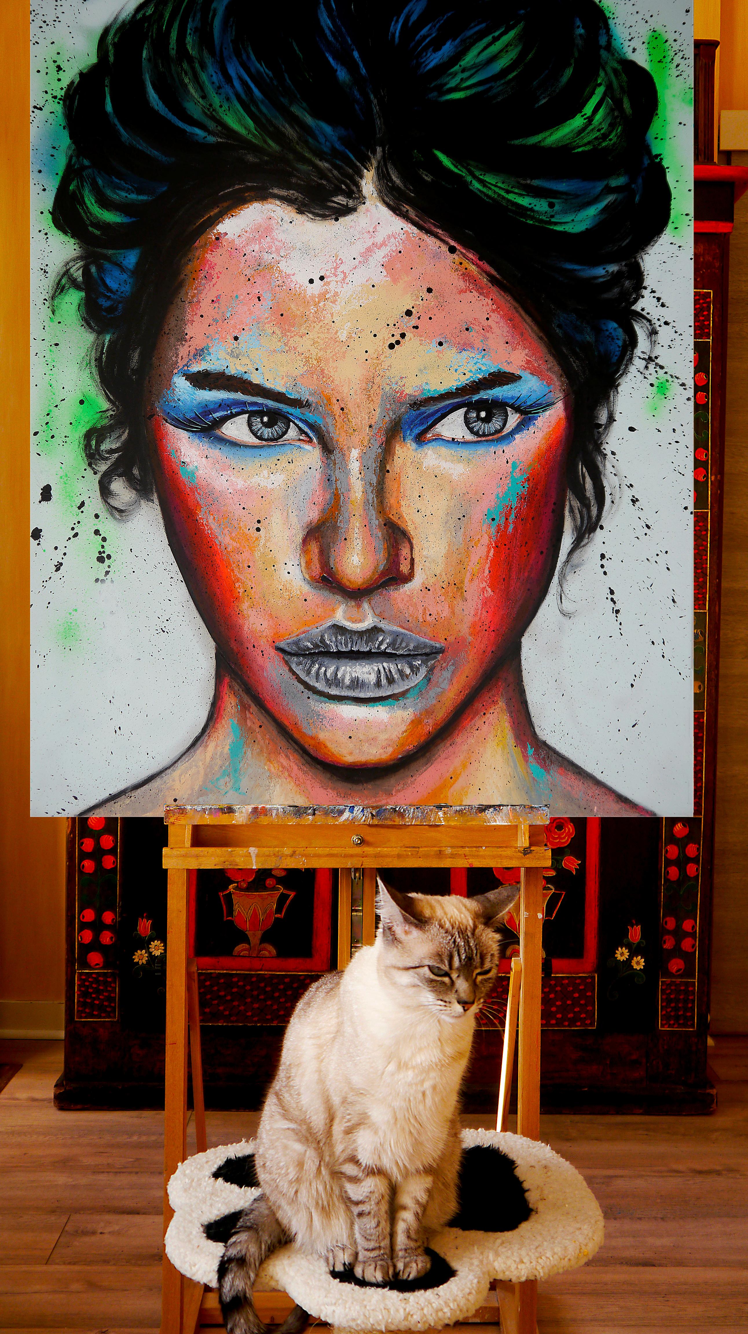 Ce portrait est une puissante démonstration d'émotions et de profondeur psychologique, mêlant intensité brute et couleurs vibrantes. Le visage du tableau fixe directement le spectateur, avec un mélange de confrontation et de contemplation à la fois