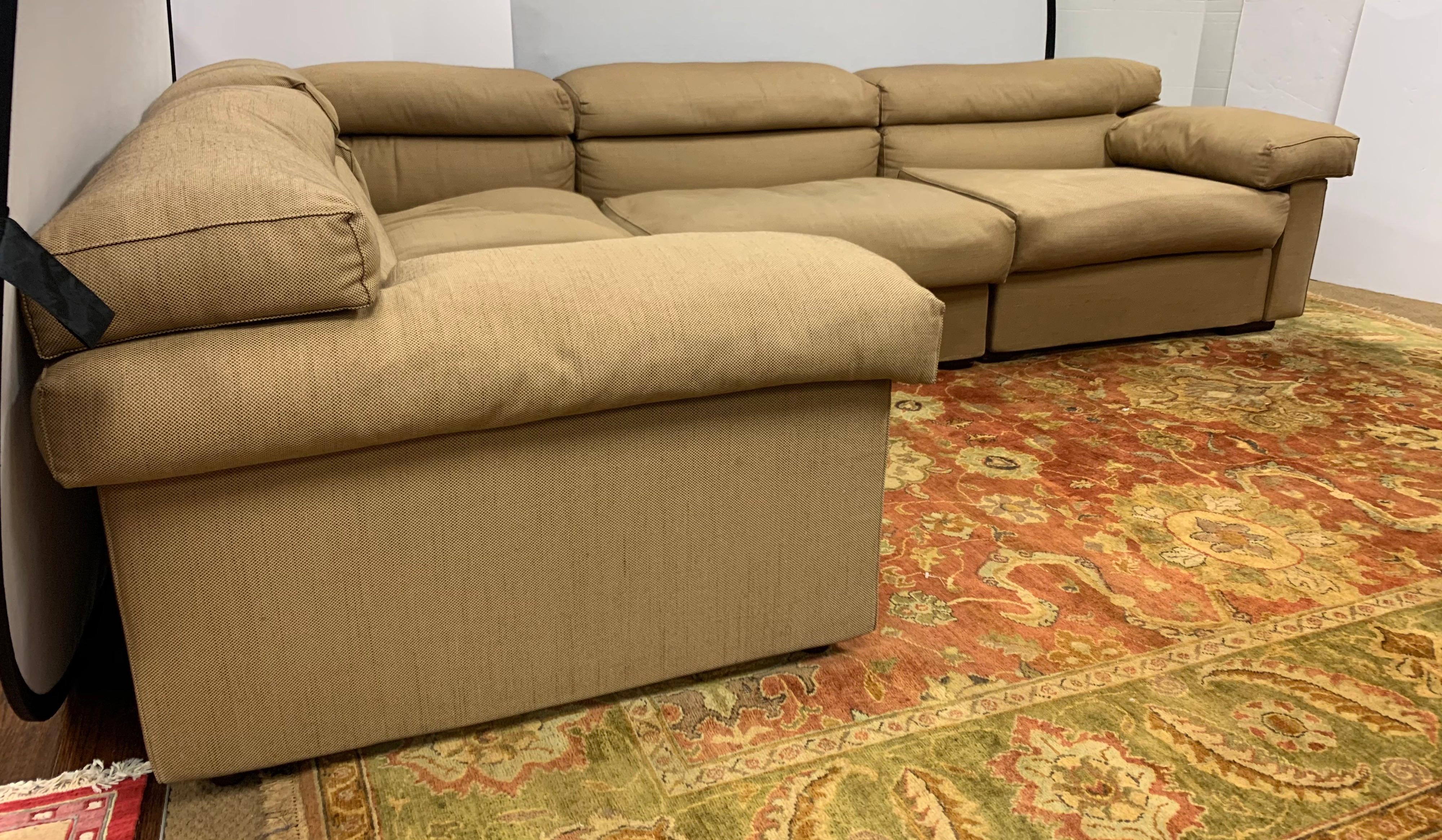 A magnificent signed four piece modular Erasmo sectional by B&B Italia. The Erasmo is one of the most coveted Afra & Tobia Scarpa designs in the world today. The fabric on this sectional is called 