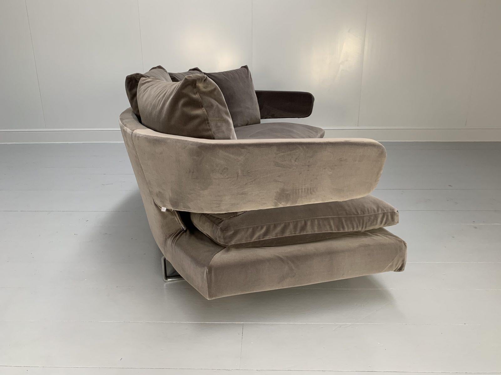 This is a sublime, rare “Arne A252C” curved, 4-Seat Sofa from the world renown Italian furniture house of B&B Italia.
 
In a world of temporary pleasures, B&B Italia create beautiful furniture that remains a joy forever. 
 
Both dressed in the